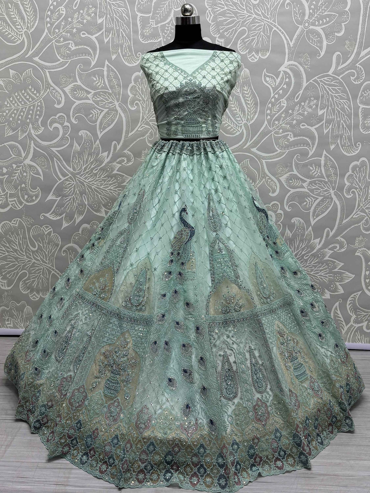 Magnetic Sea Green Multi-Thread Work Net Lehenga Choli With Dupatta