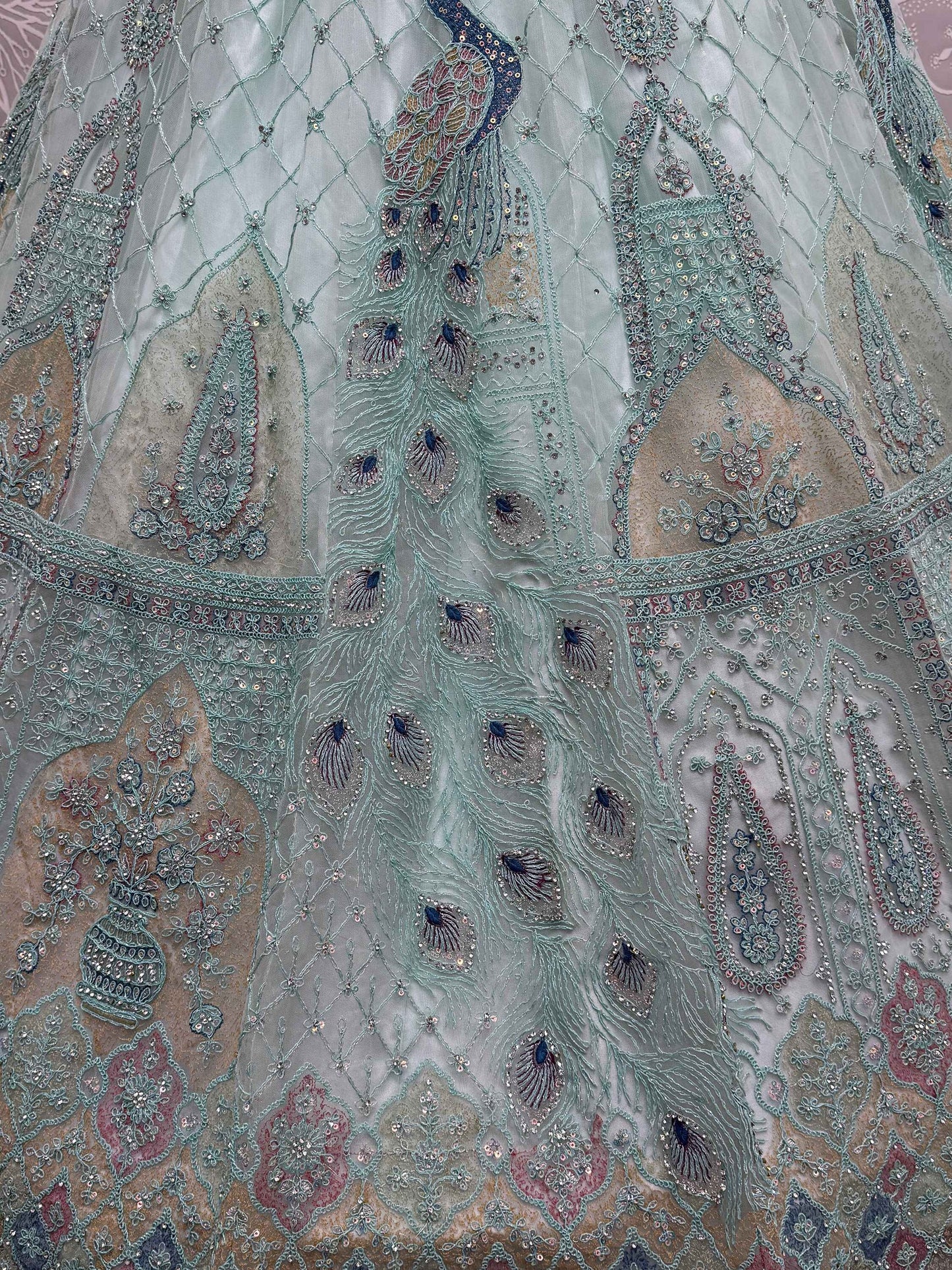 Magnetic Sea Green Multi-Thread Work Net Lehenga Choli With Dupatta