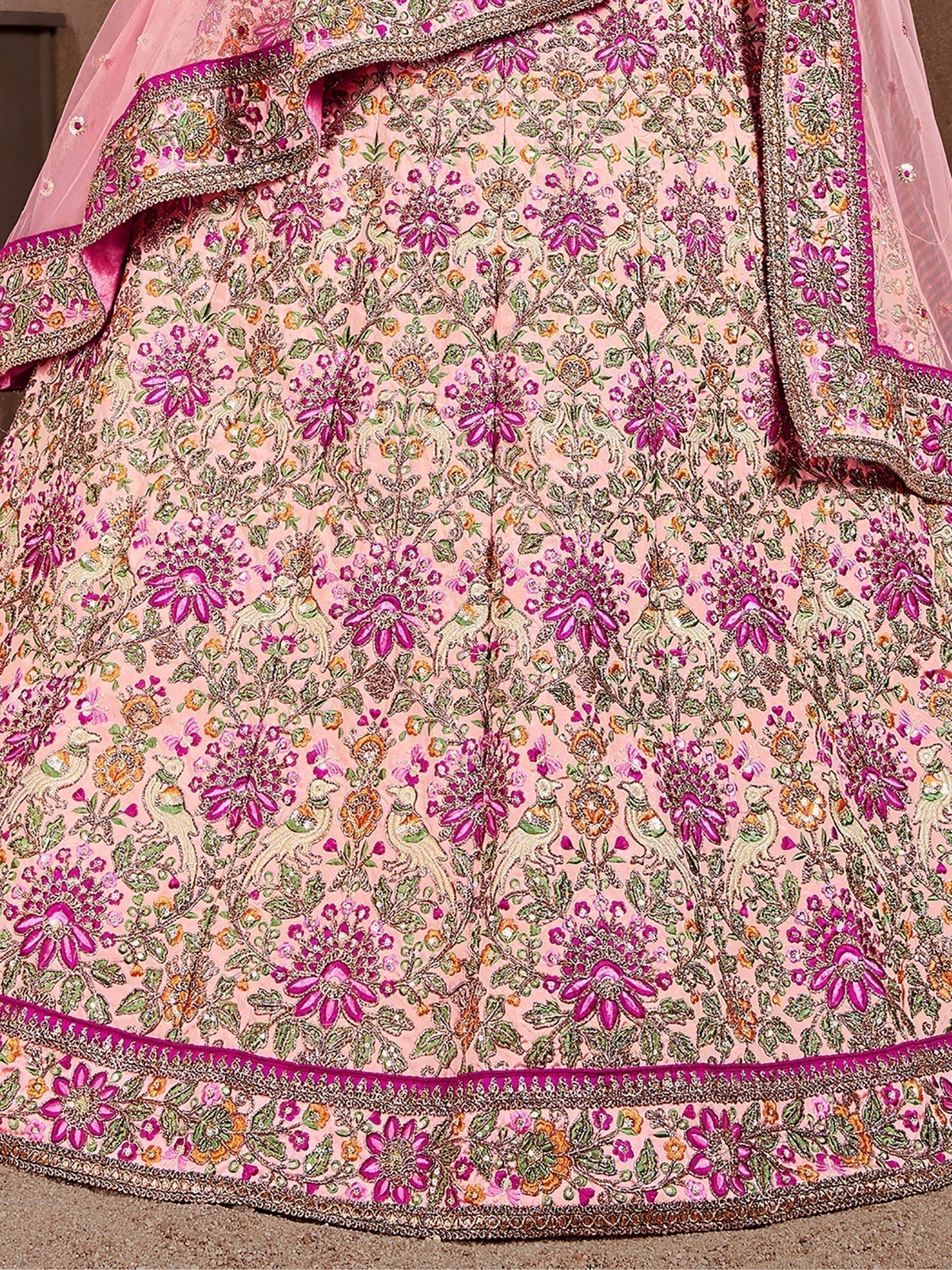 Prominent peach Colored Bridal wear Embroidered Lehenga Choli