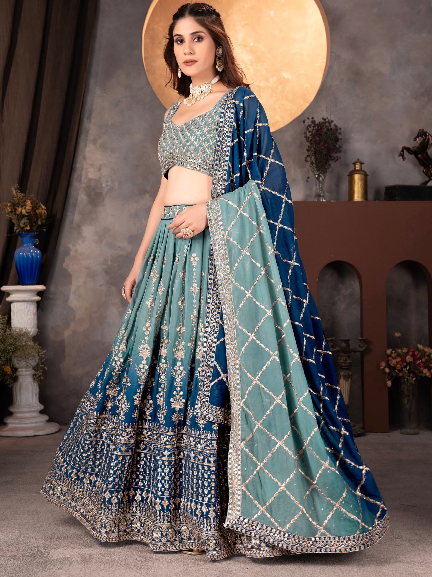 Dreamy Light Blue Sequins Georgette Wedding Wear Lehenga Choli With Dupatta