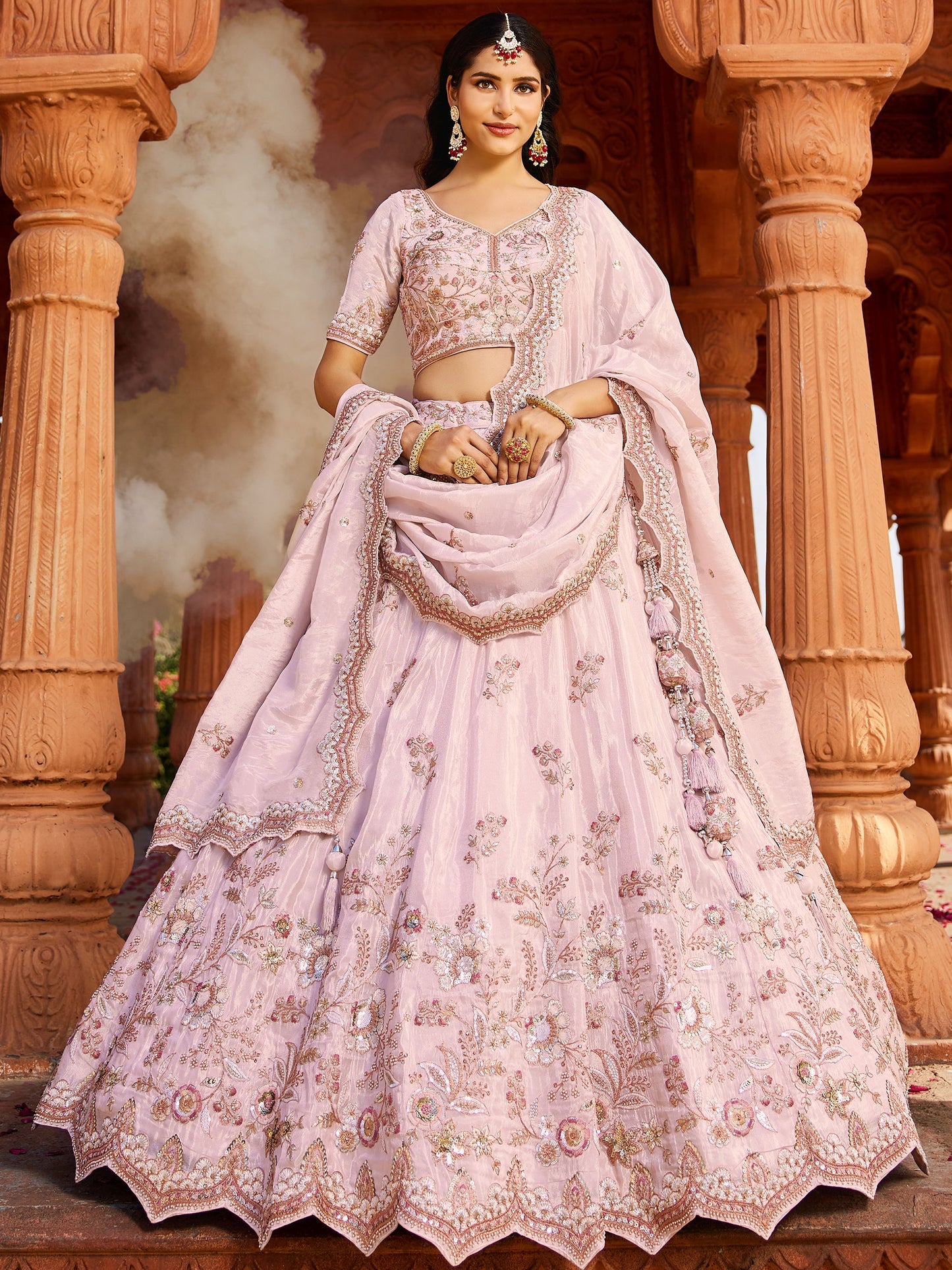 Astonishing Coral Pink Thread Embroidered Tissue Silk Engagement Wear Lehenga Choli