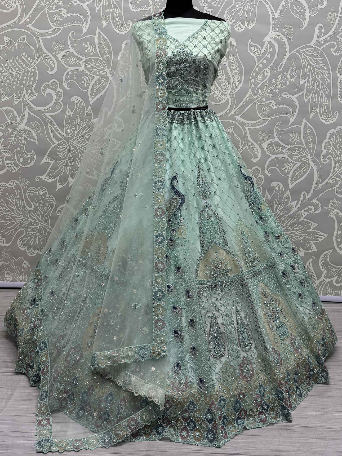 Magnetic Sea Green Multi-Thread Work Net Lehenga Choli With Dupatta