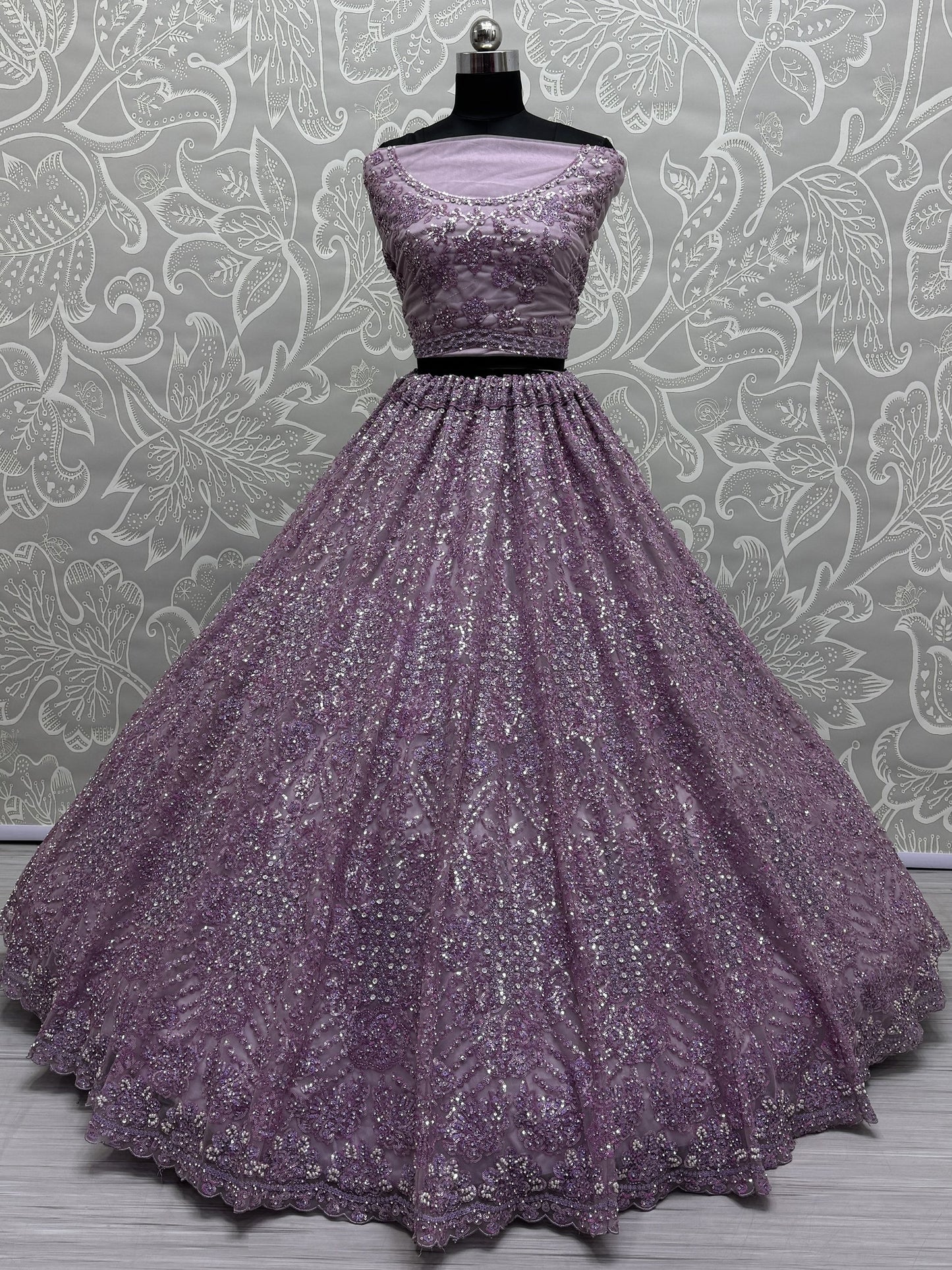 Amazing Purple Sequins Heavy Net Wedding Wear Lehenga Choli