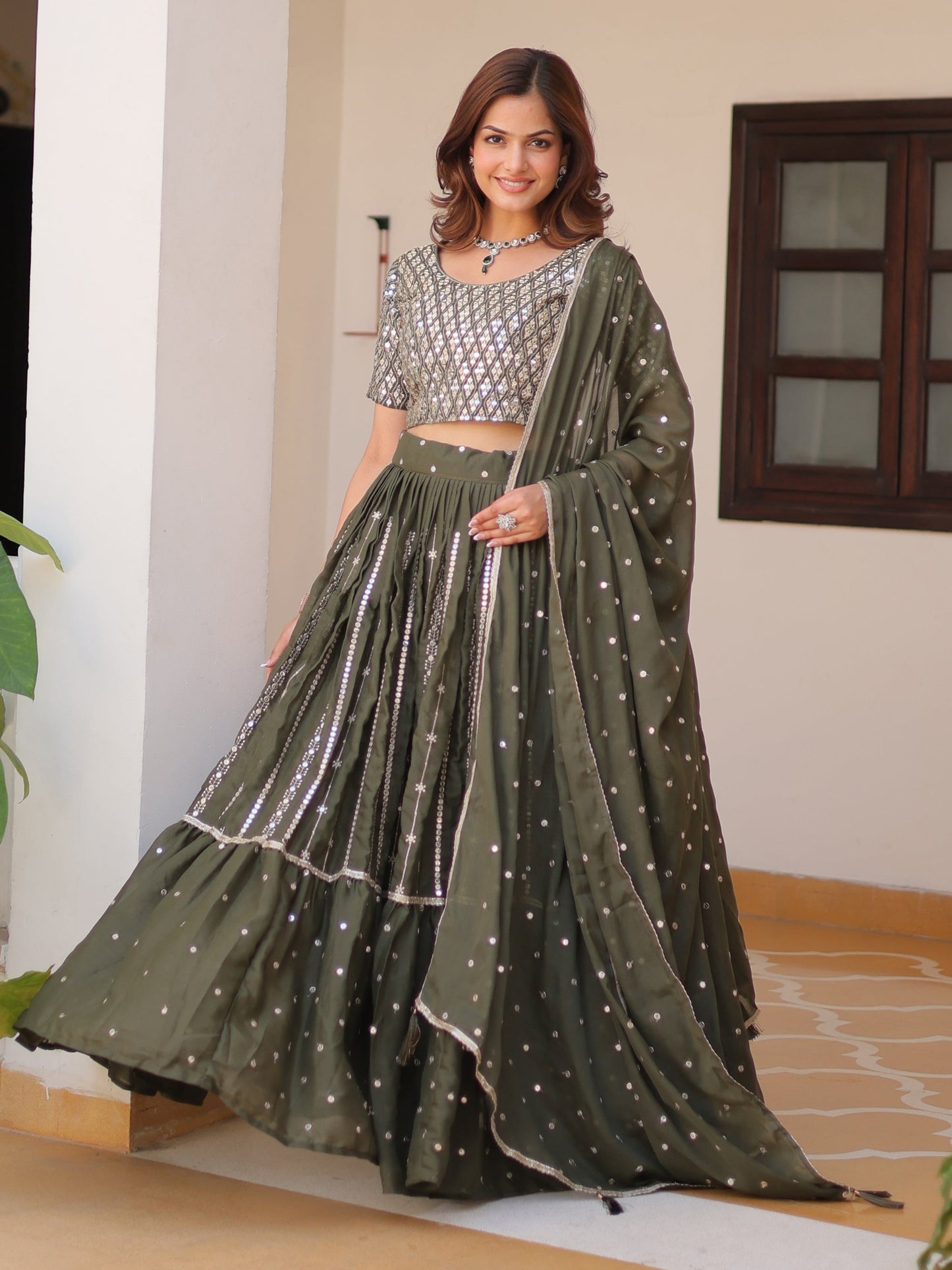 Gorgeous Green Sequins Georgette Mehendi Wear Lehenga Choli With Dupatta