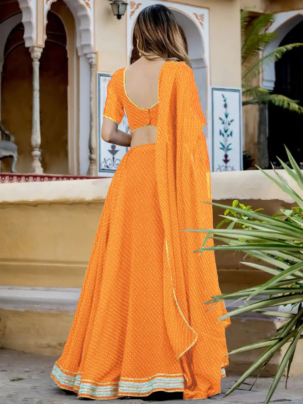 Enchanting Orange Laheriya Print Georgette Designer Lehenga Choli - Zeel Clothing