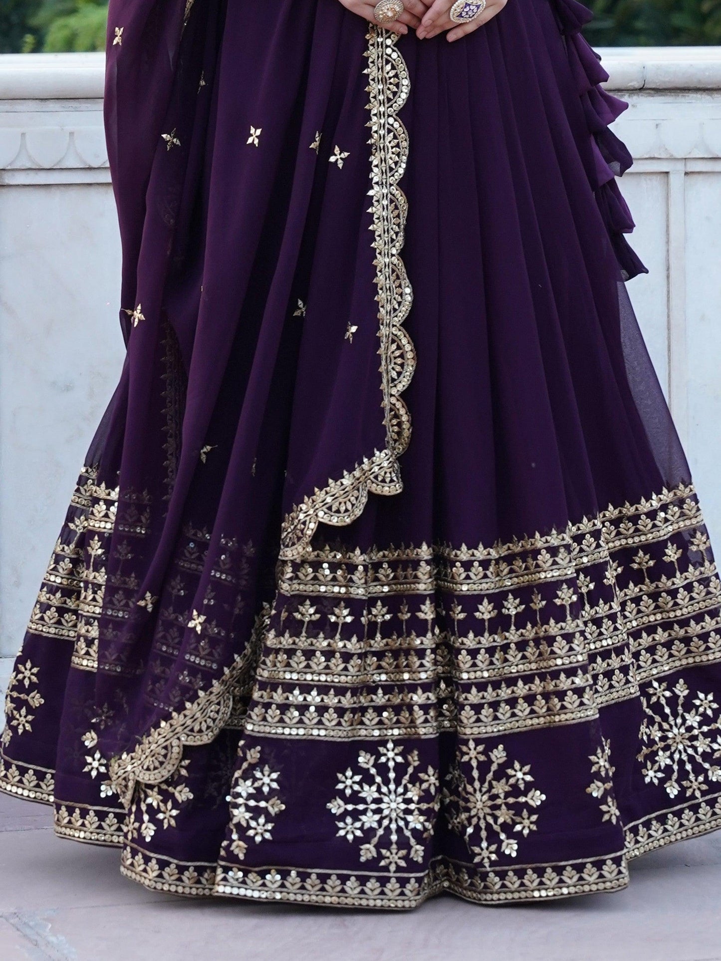 Surprising Purple Sequins Georgette Wedding Wear Lehenga Choli
