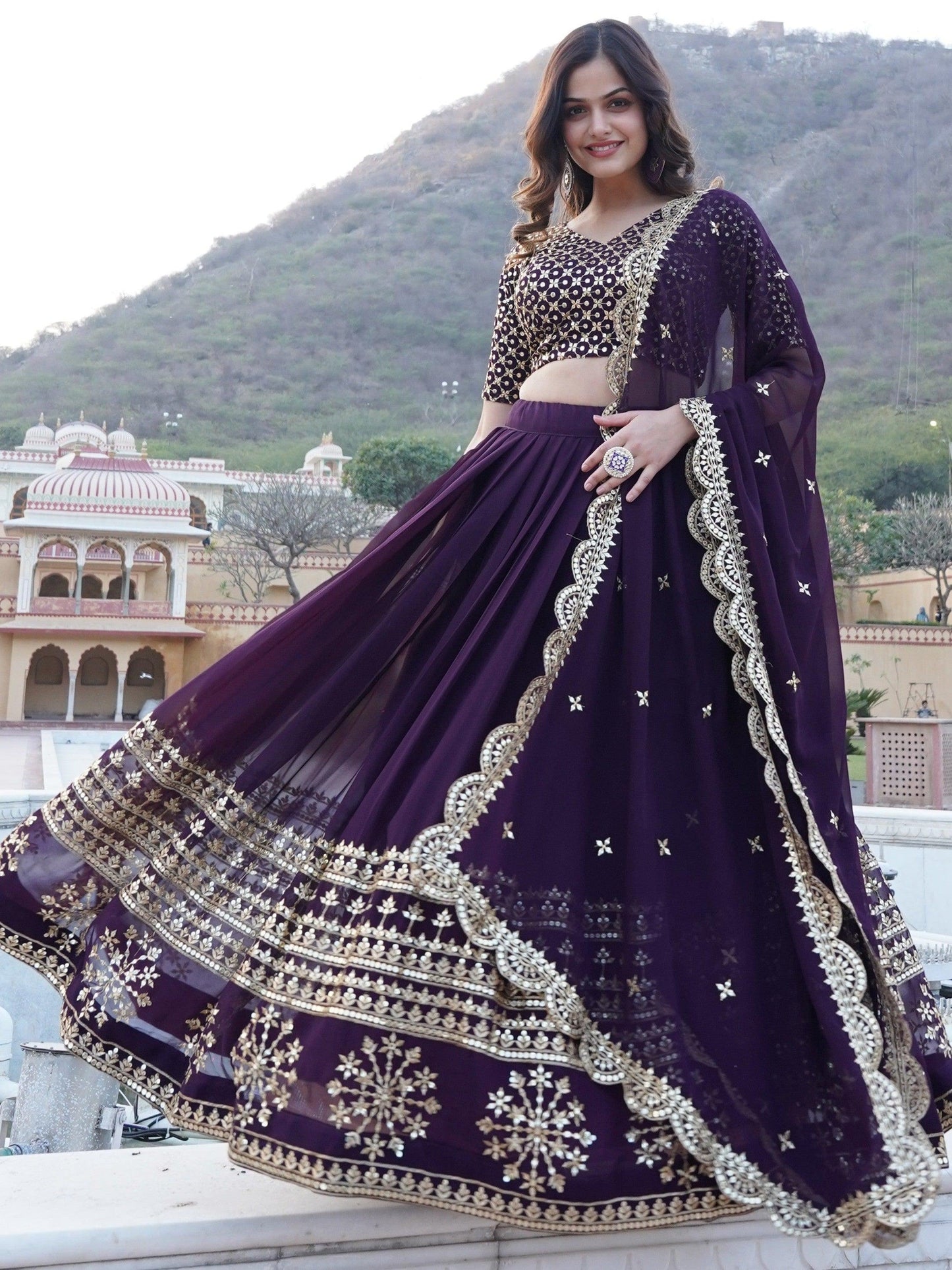 Surprising Purple Sequins Georgette Wedding Wear Lehenga Choli