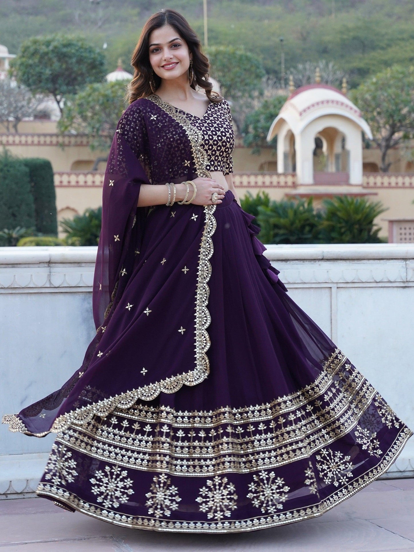 Surprising Purple Sequins Georgette Wedding Wear Lehenga Choli