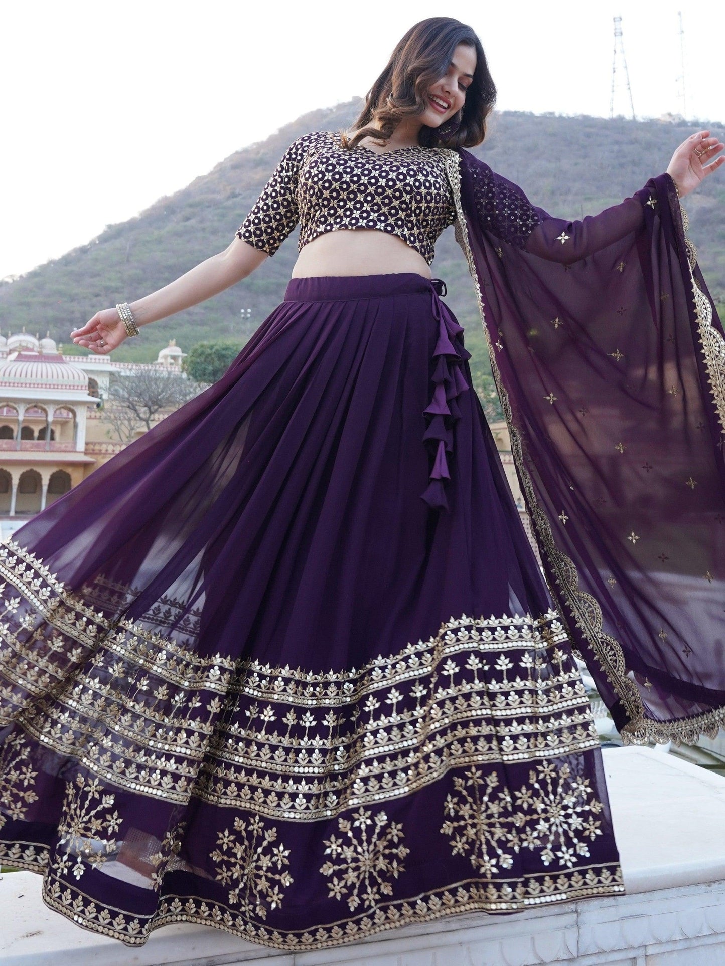Surprising Purple Sequins Georgette Wedding Wear Lehenga Choli