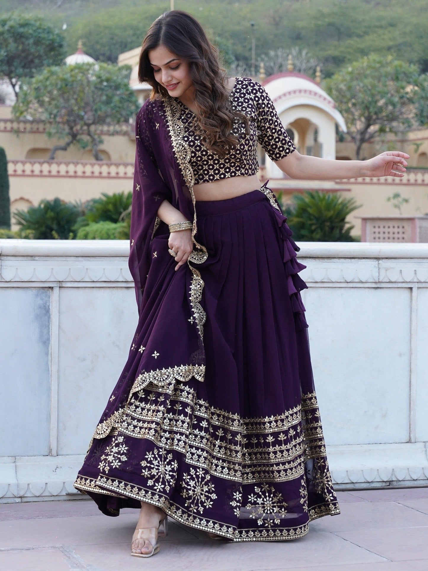 Surprising Purple Sequins Georgette Wedding Wear Lehenga Choli