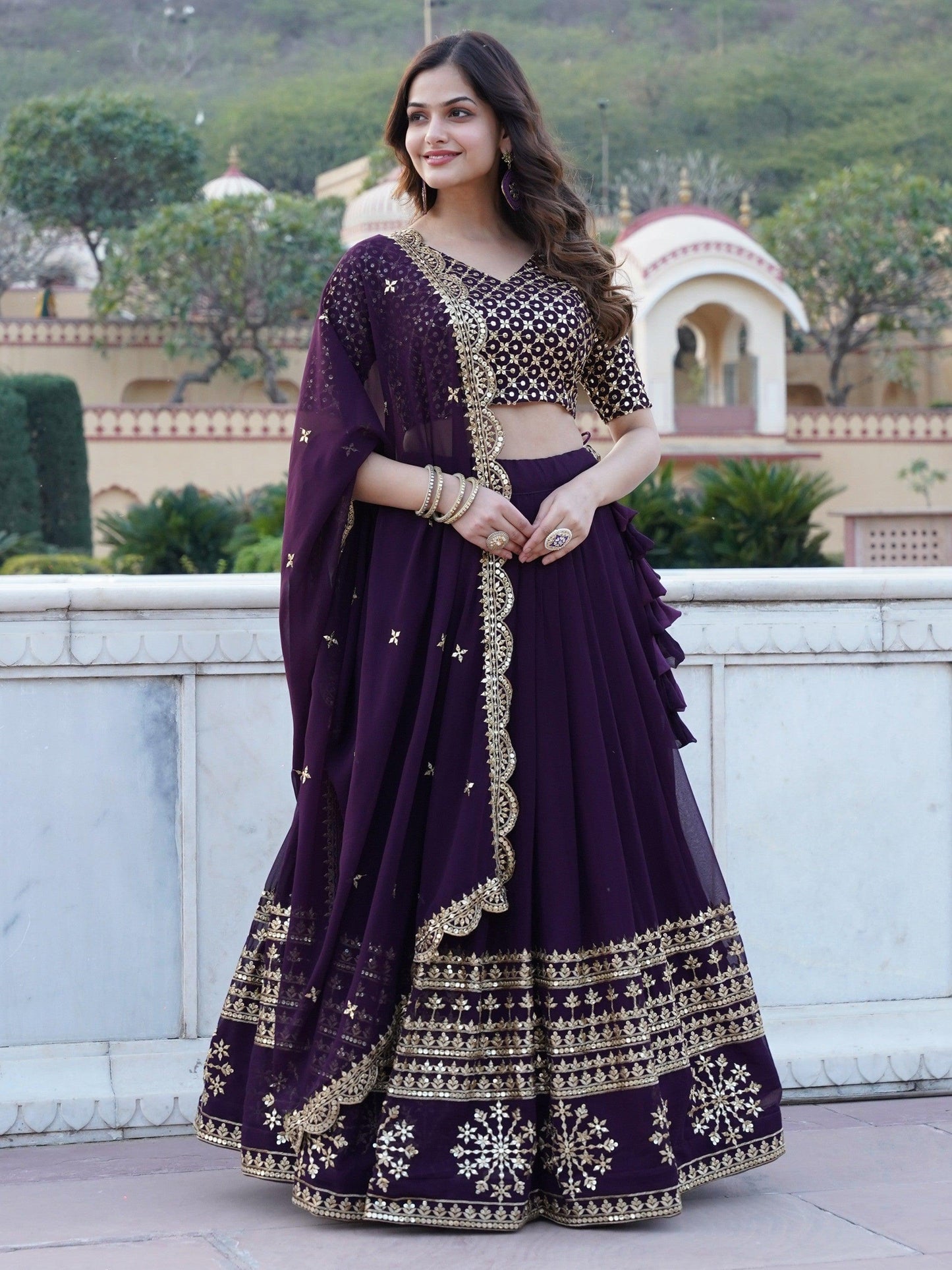 Surprising Purple Sequins Georgette Wedding Wear Lehenga Choli