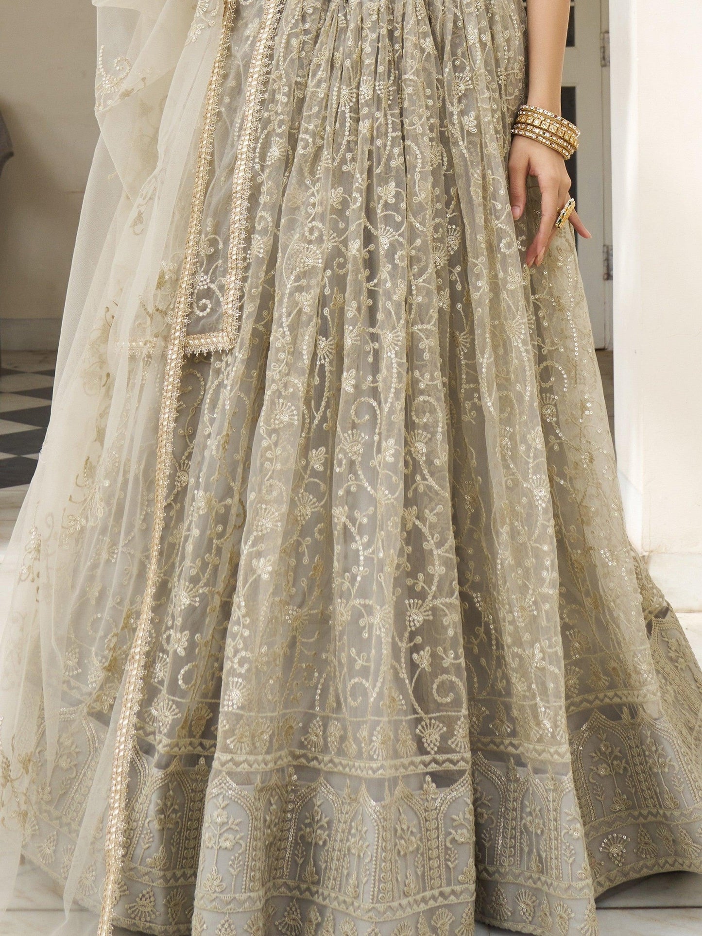 Bewitching Ivory Thread Work Net Engagement Wear Lehenga Choli