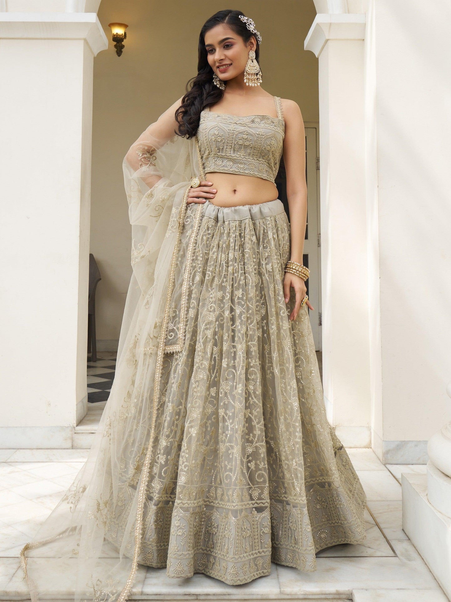 Bewitching Ivory Thread Work Net Engagement Wear Lehenga Choli