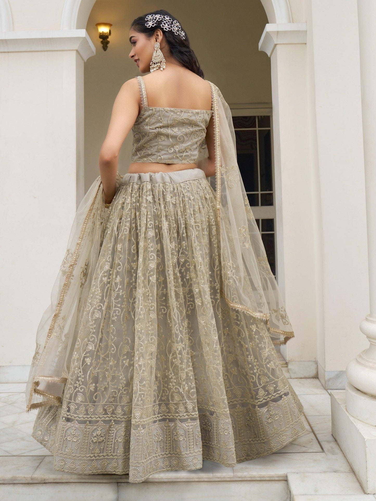 Bewitching Ivory Thread Work Net Engagement Wear Lehenga Choli