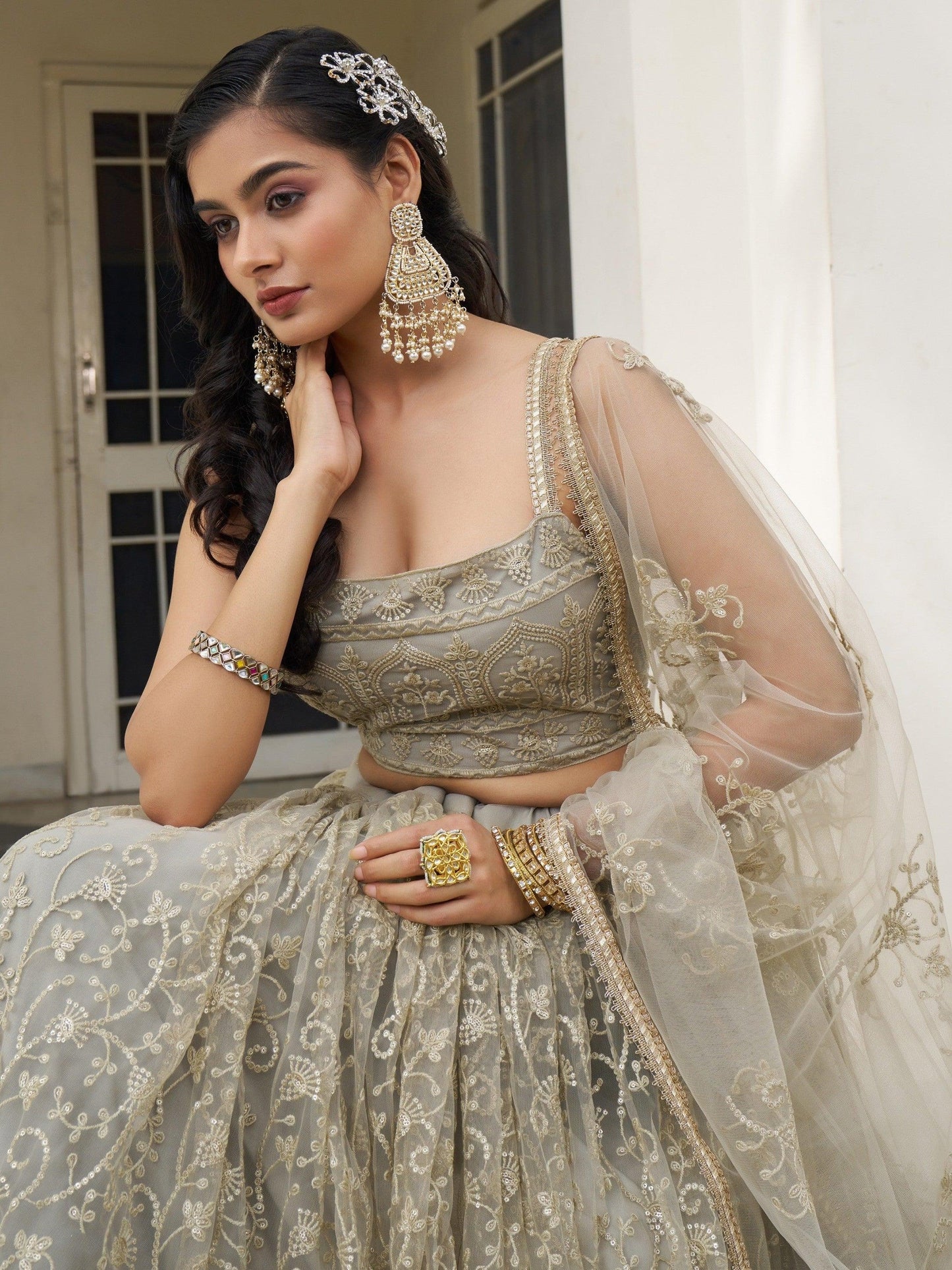 Bewitching Ivory Thread Work Net Engagement Wear Lehenga Choli