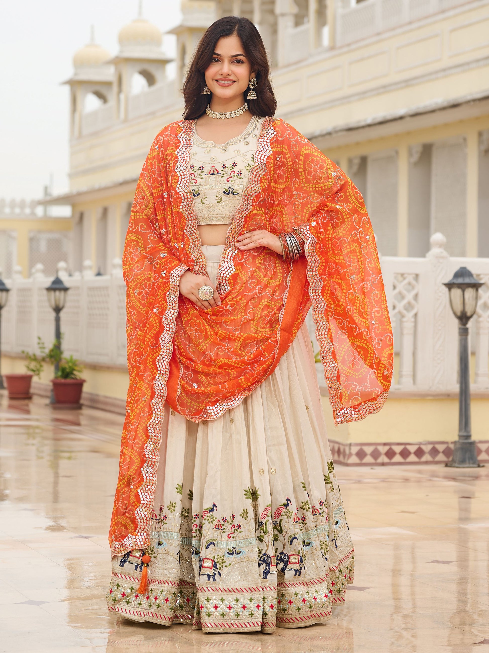 Beautiful Off-White Sequins Tissue Lehenga Choli With Orange Dupatta