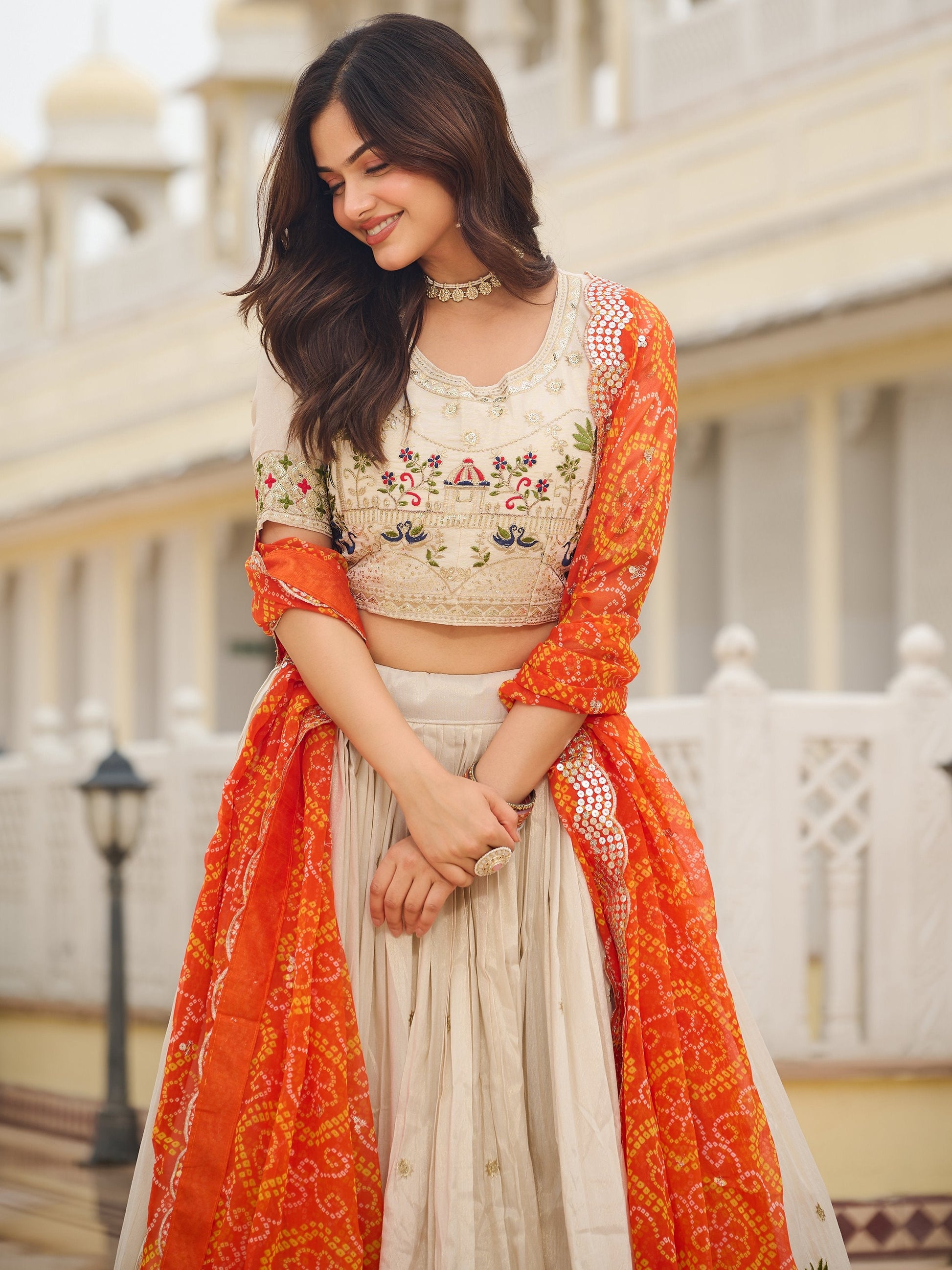 Beautiful Off-White Sequins Tissue Lehenga Choli With Orange Dupatta