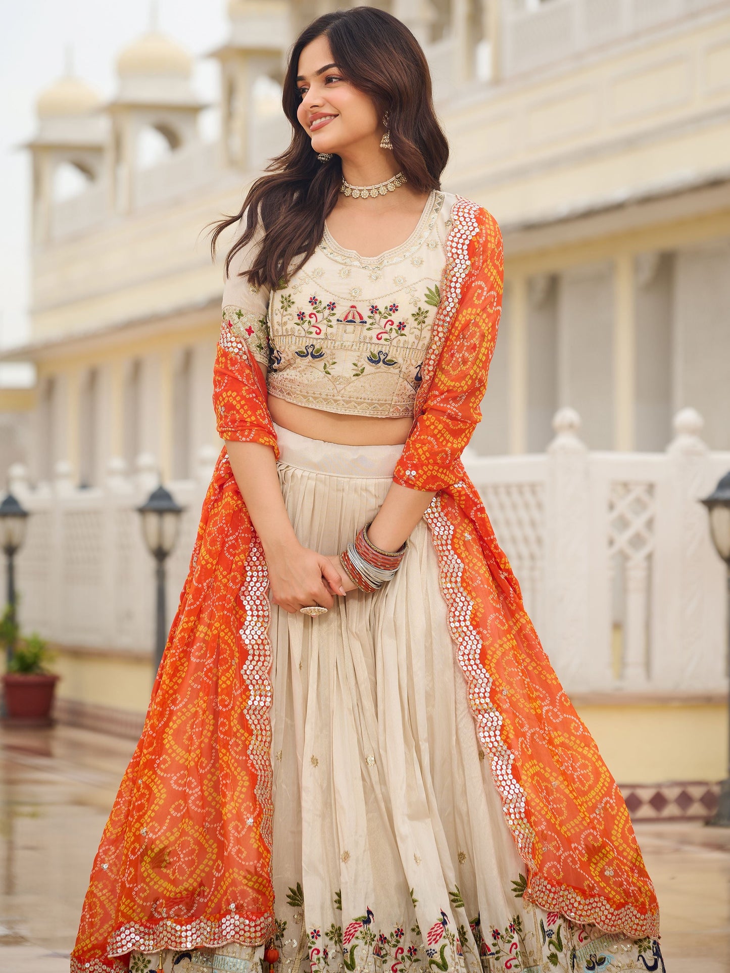 Beautiful Off-White Sequins Tissue Lehenga Choli With Orange Dupatta