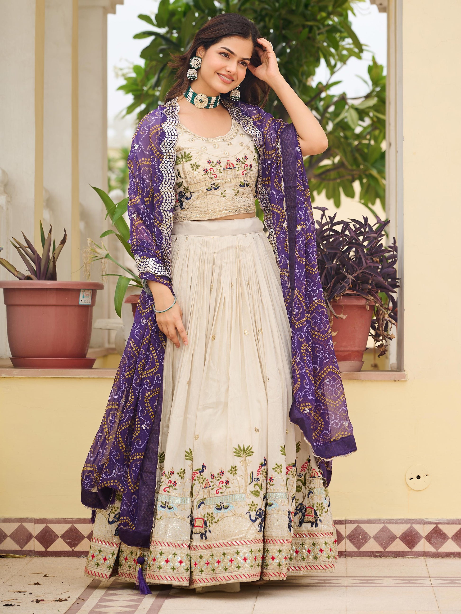 Gorgeous Off-White Thread Work Tissue Evening Wear Lehenga Choli With Purple Dupatta