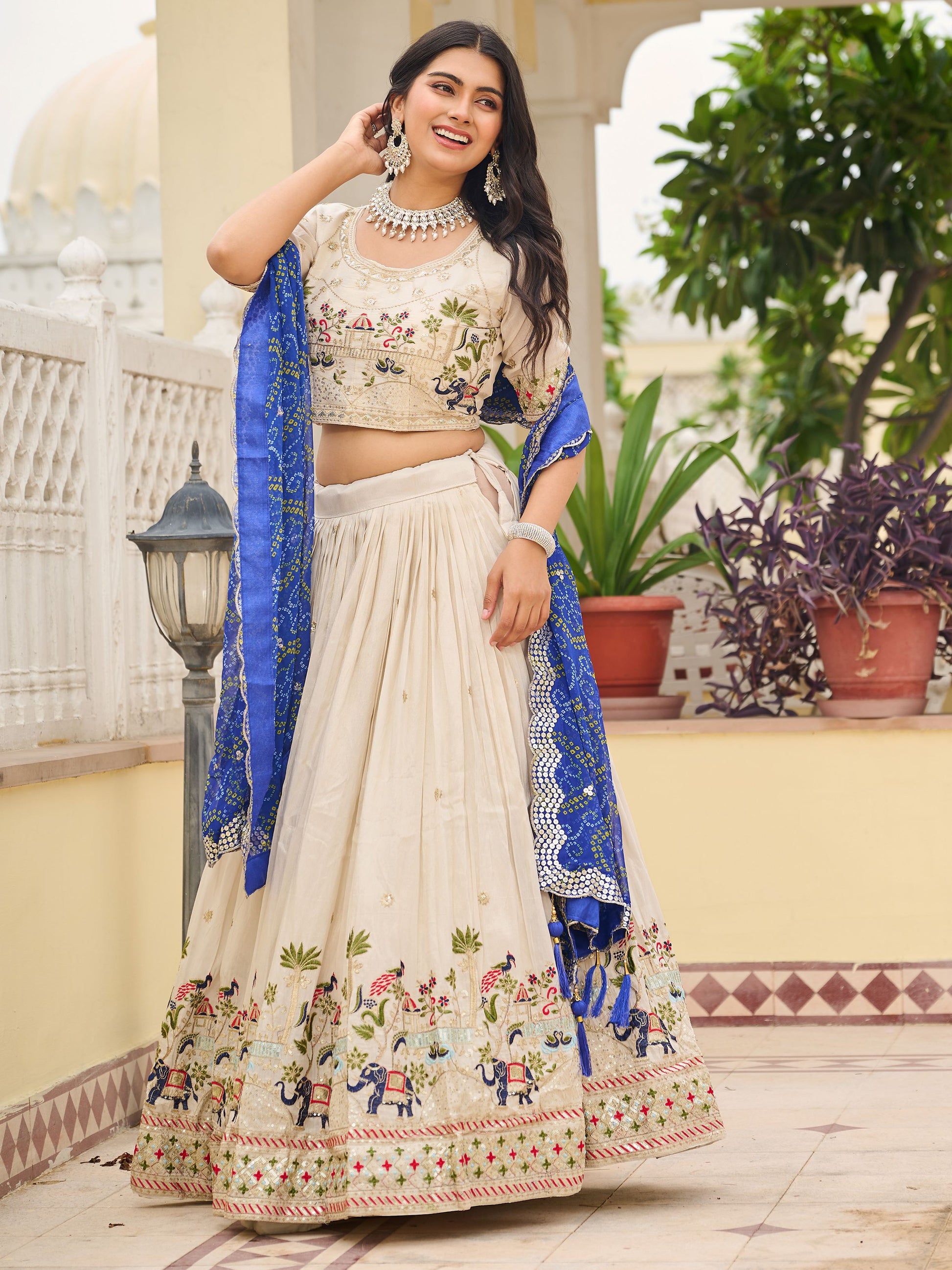 Attractive Off-White Thread Work Tissue Event Wear Lehenga Choli With Blue Dupatta