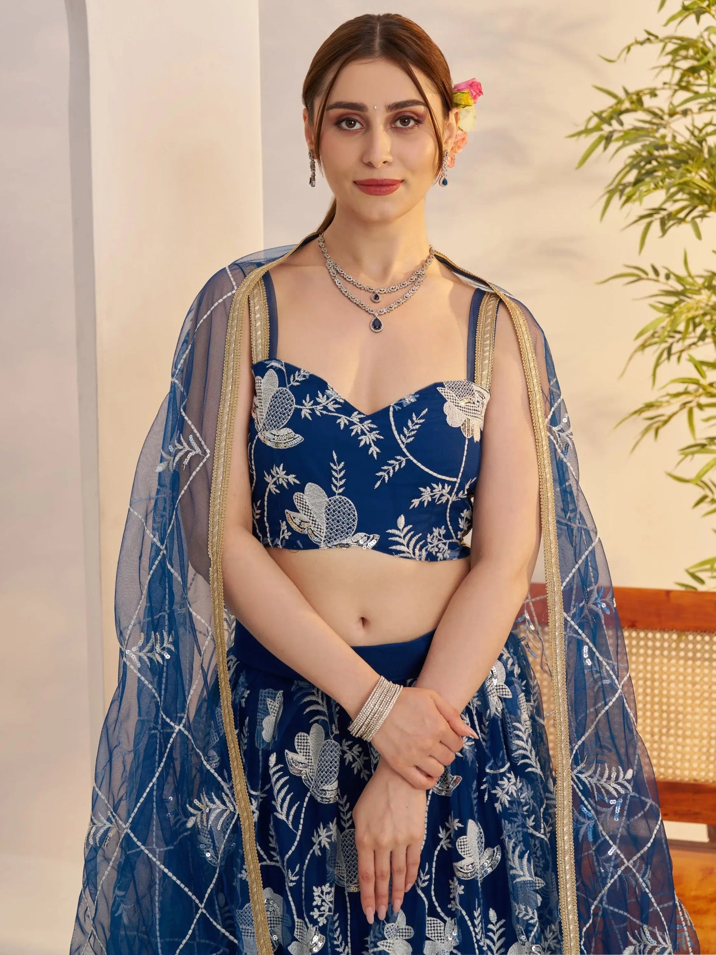 Adoring Teal Blue Floral Embroidery Net Engagement Wear Lehenga Choli
