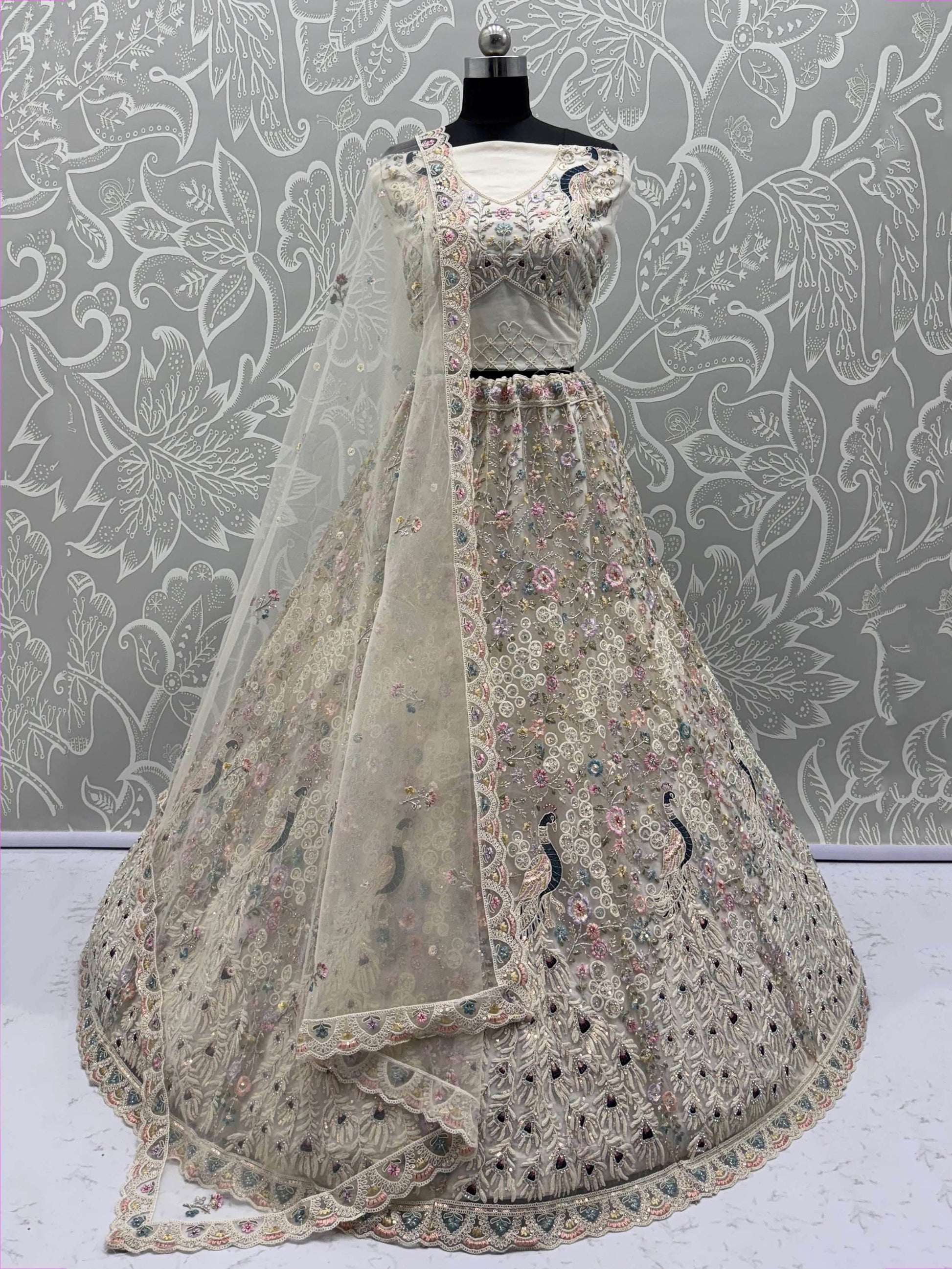 Stupendous White Thread Work Net Reception Wear Lehenga Choli With Dupatta