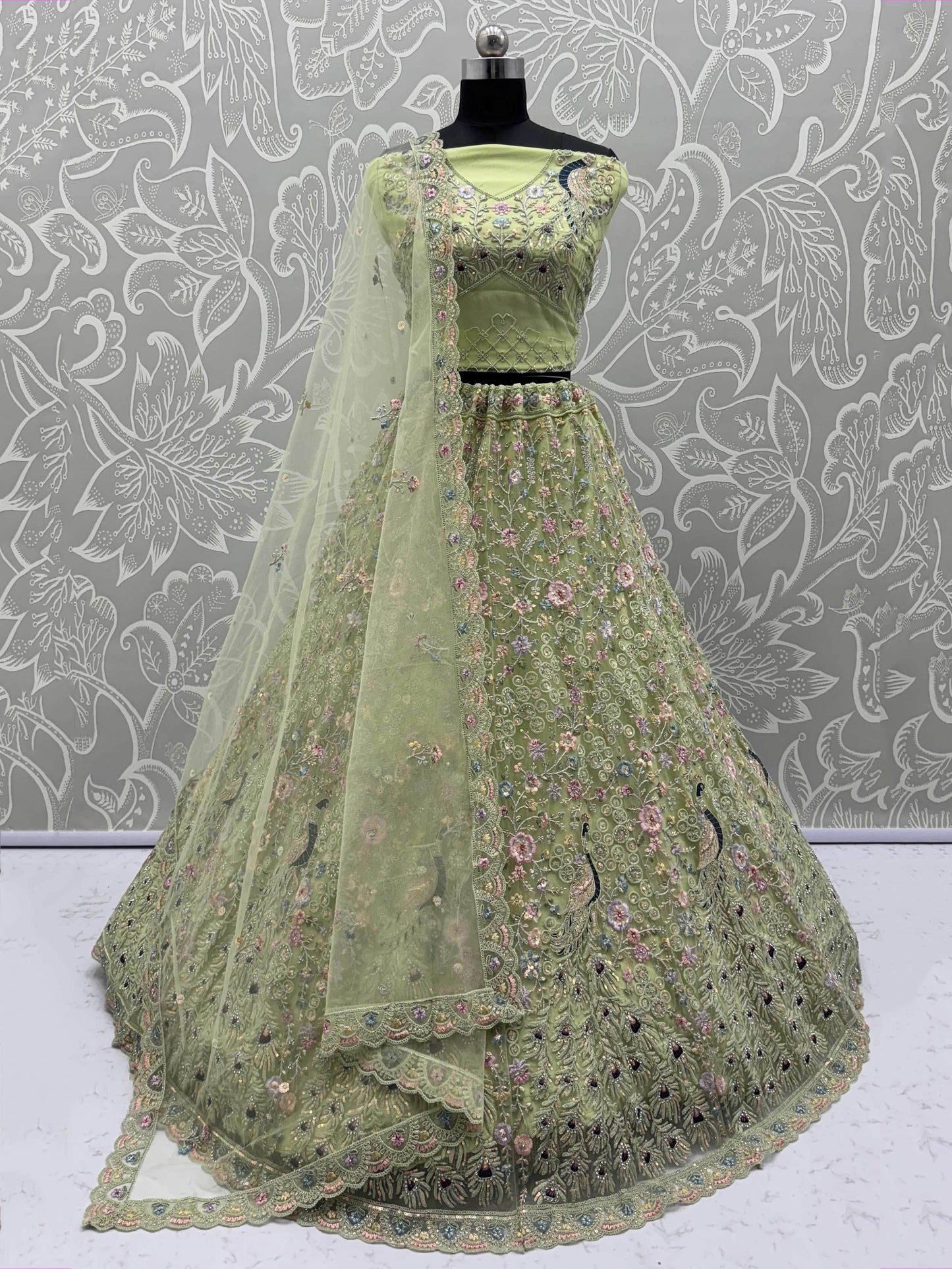 Pretty Green Zircon Work Net Sangeet Wear Lehenga Choli With Dupatta
