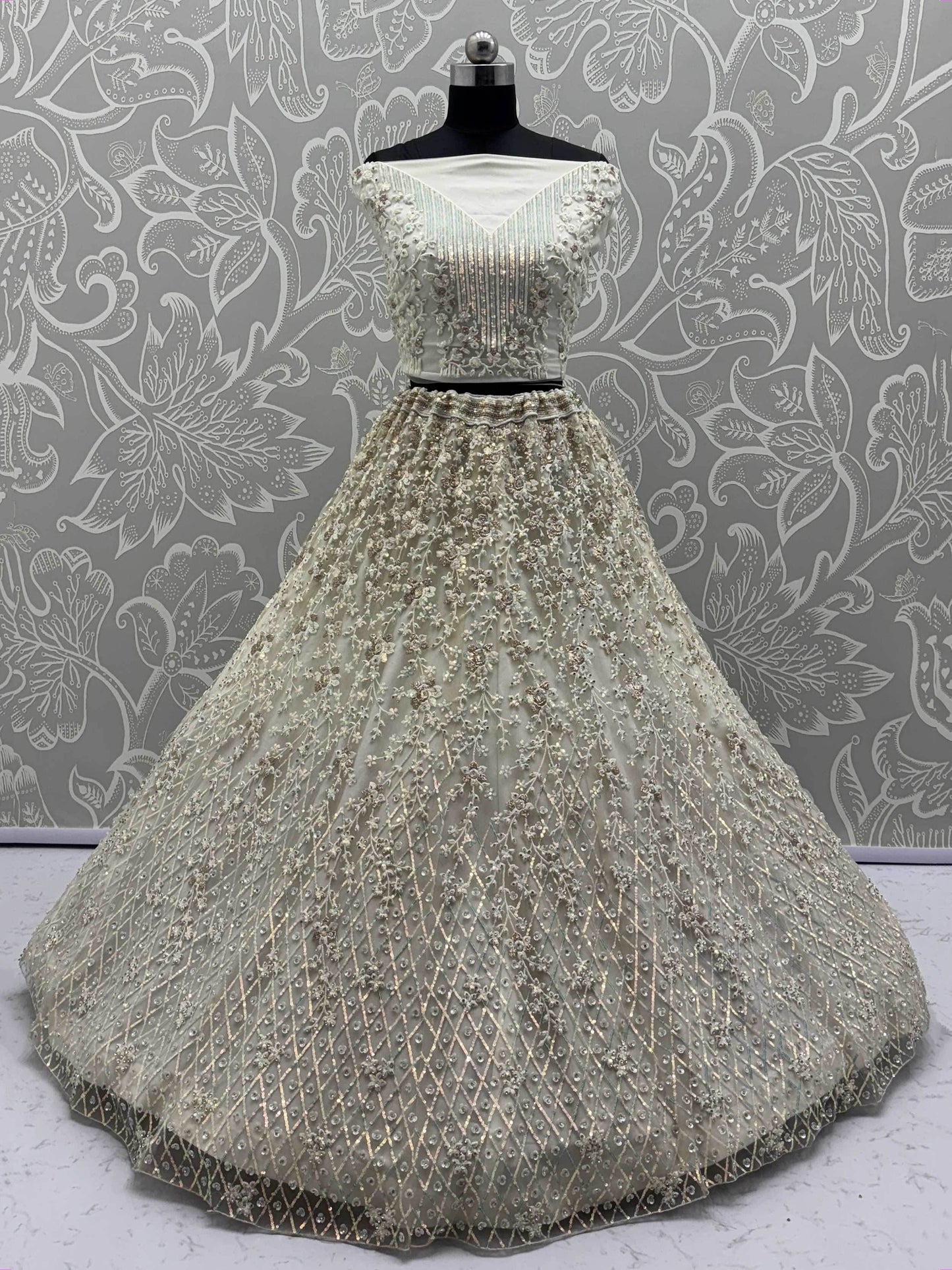 Dazzling Beige Zari Work Net Evening Wear Lehenga Choli With Dupatta