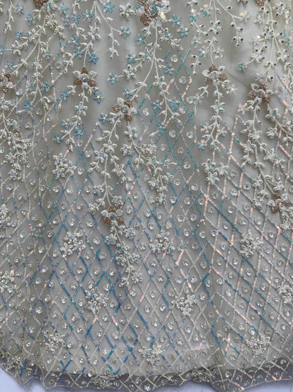 Dazzling Beige Zari Work Net Evening Wear Lehenga Choli With Dupatta