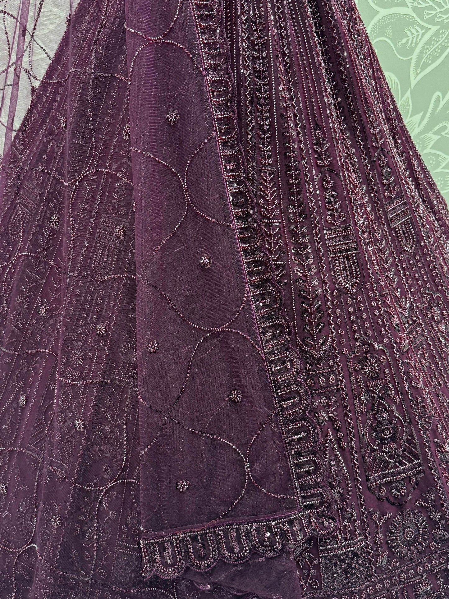 Monochrome Wine Sequins Embroidery Net Sangeet Wear Lehenga Choli