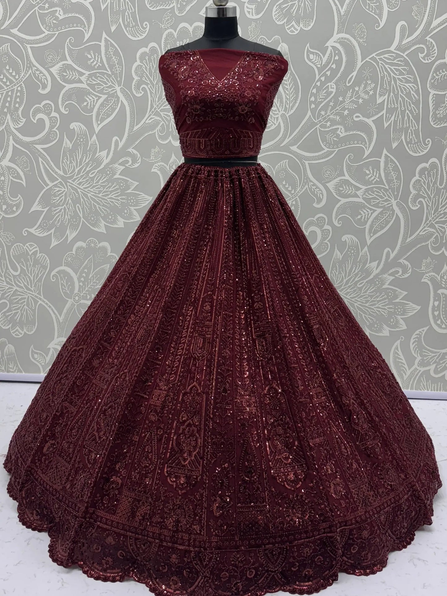 Stellar Maroon Thread Work Net Bridal Lehenga Choli With Dupatta