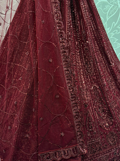 Stellar Maroon Thread Work Net Bridal Lehenga Choli With Dupatta