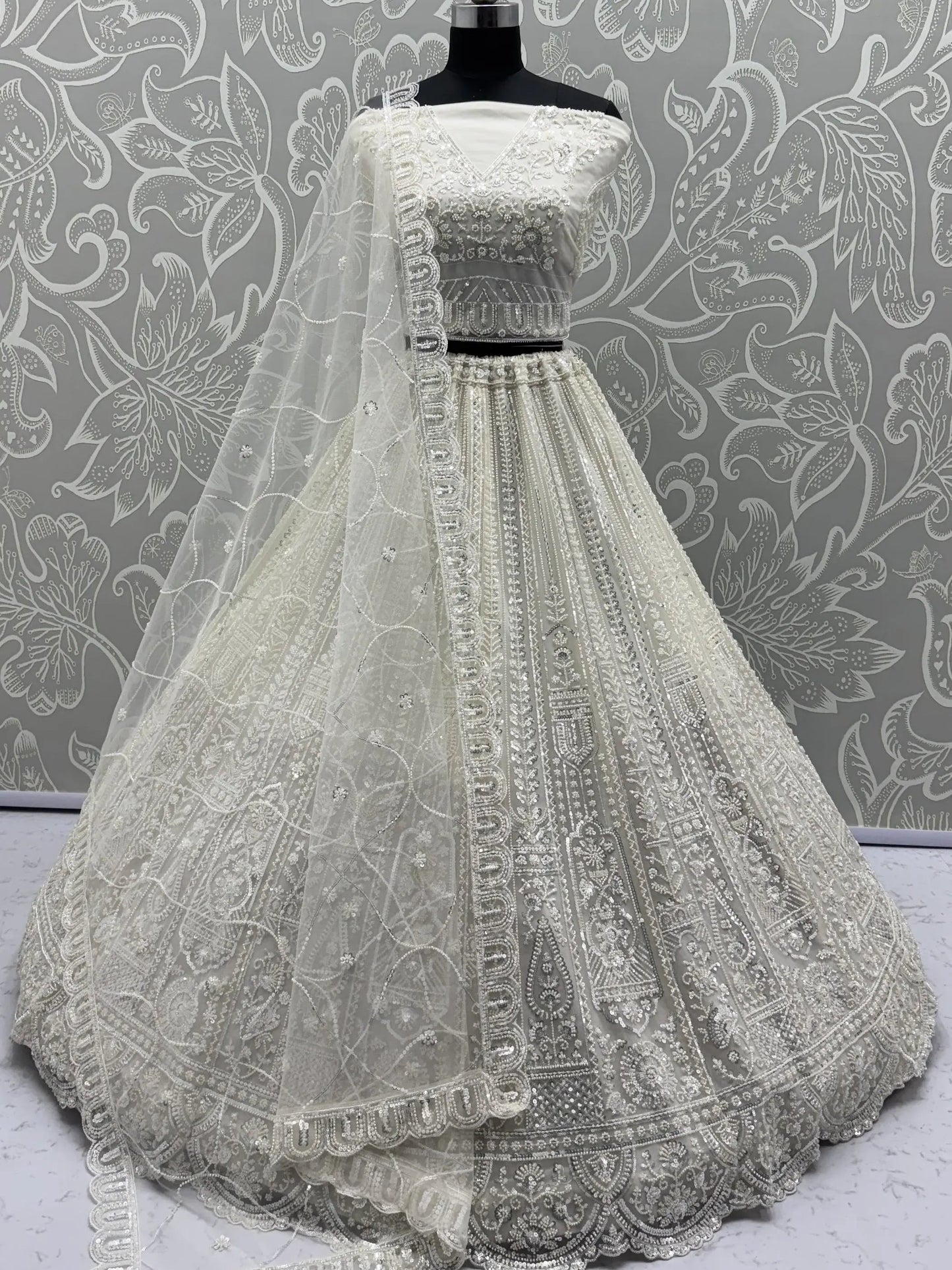 Gorgeous White Moti Work Net Engagement Wear Lehenga Choli With Dupatta