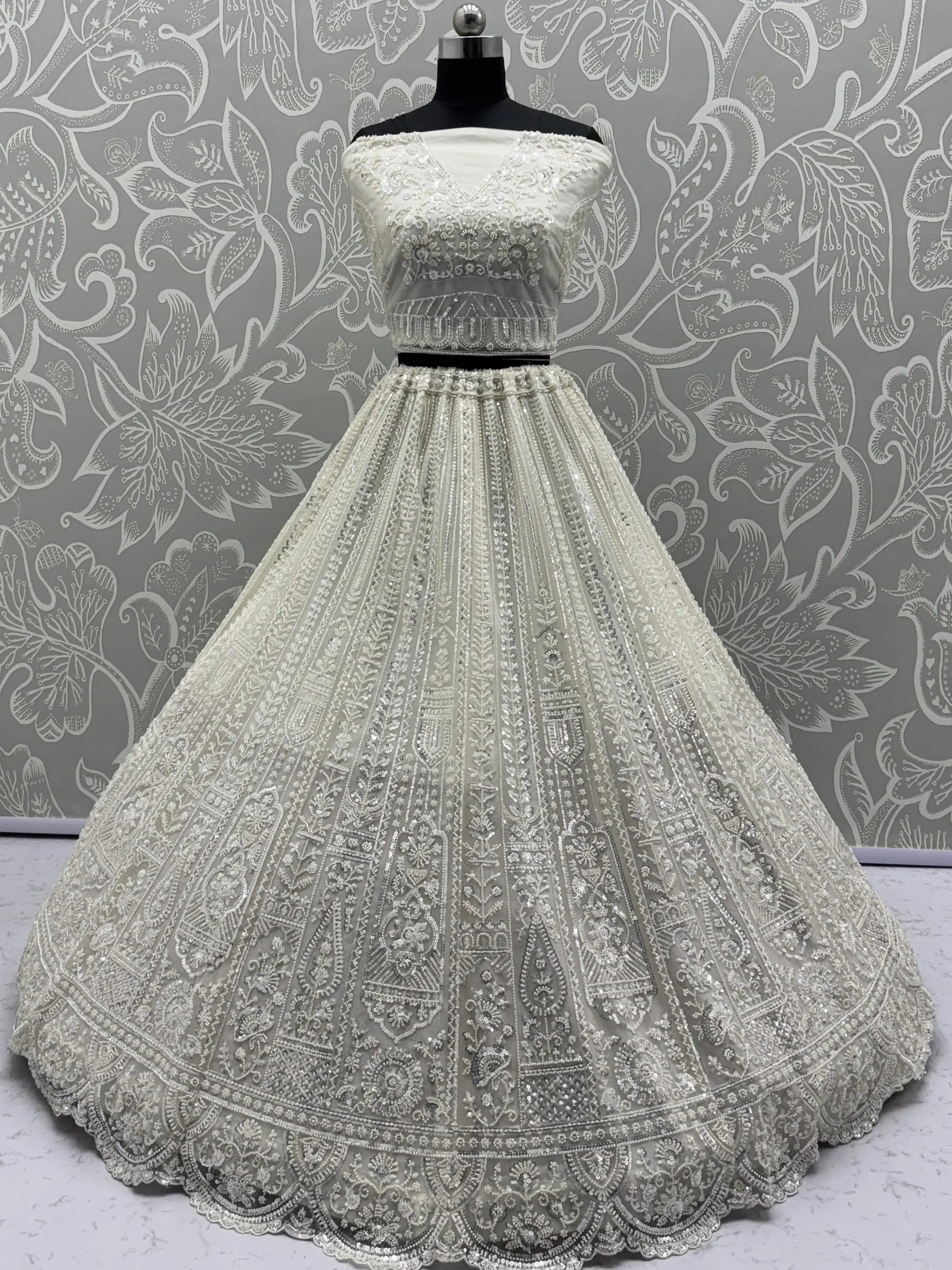 Gorgeous White Moti Work Net Engagement Wear Lehenga Choli With Dupatta