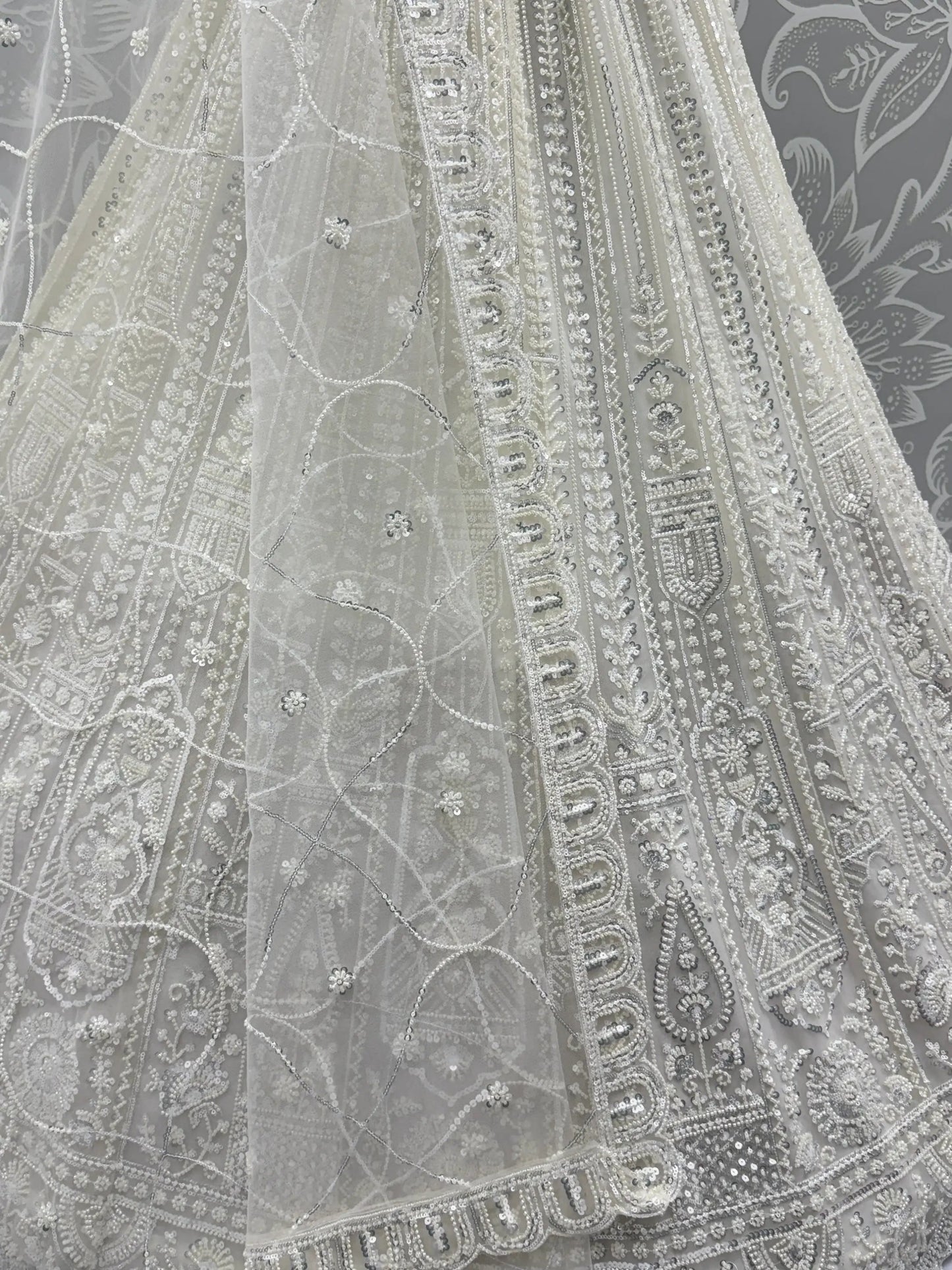 Gorgeous White Moti Work Net Engagement Wear Lehenga Choli With Dupatta