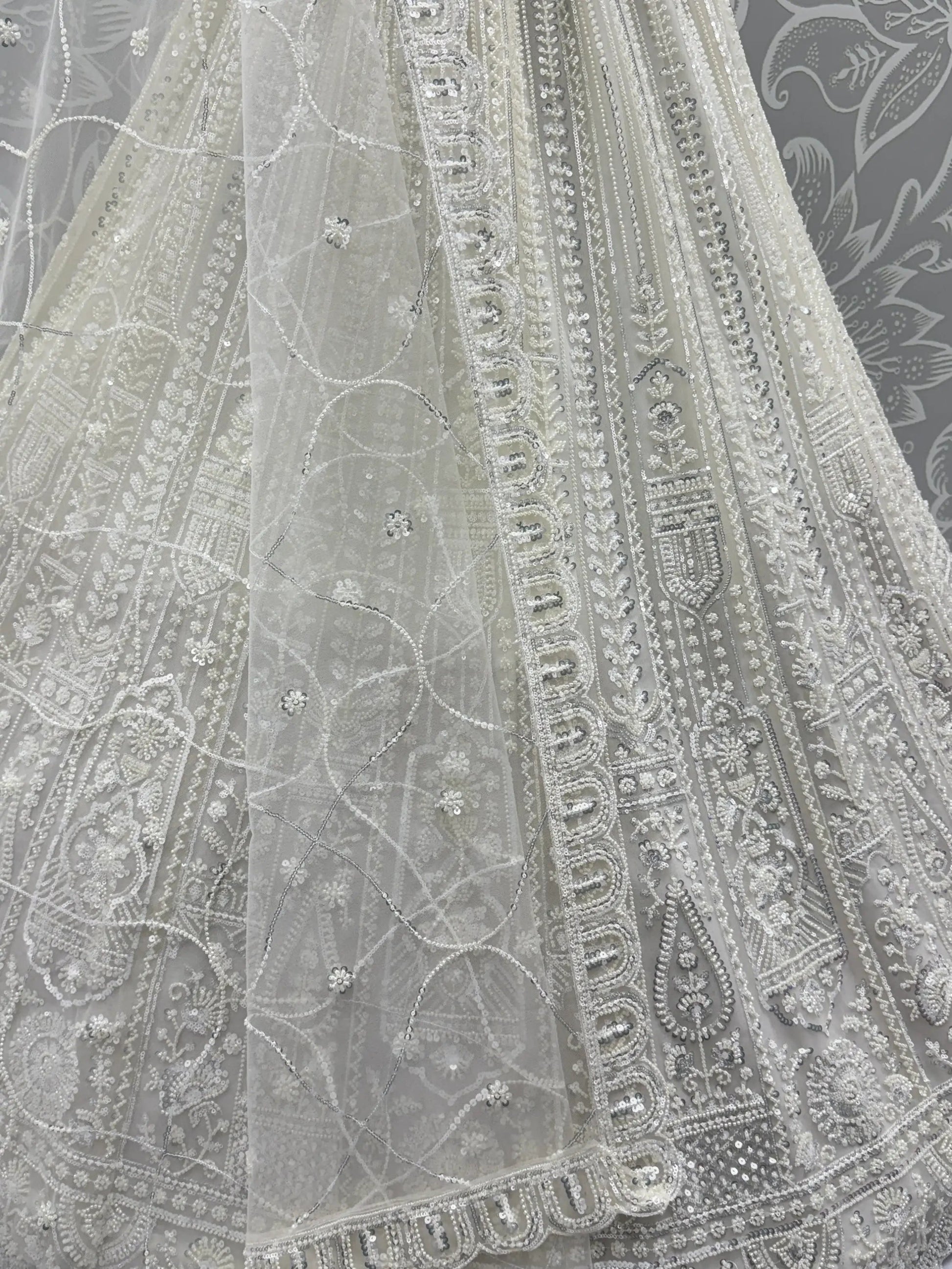 Gorgeous White Moti Work Net Engagement Wear Lehenga Choli With Dupatta