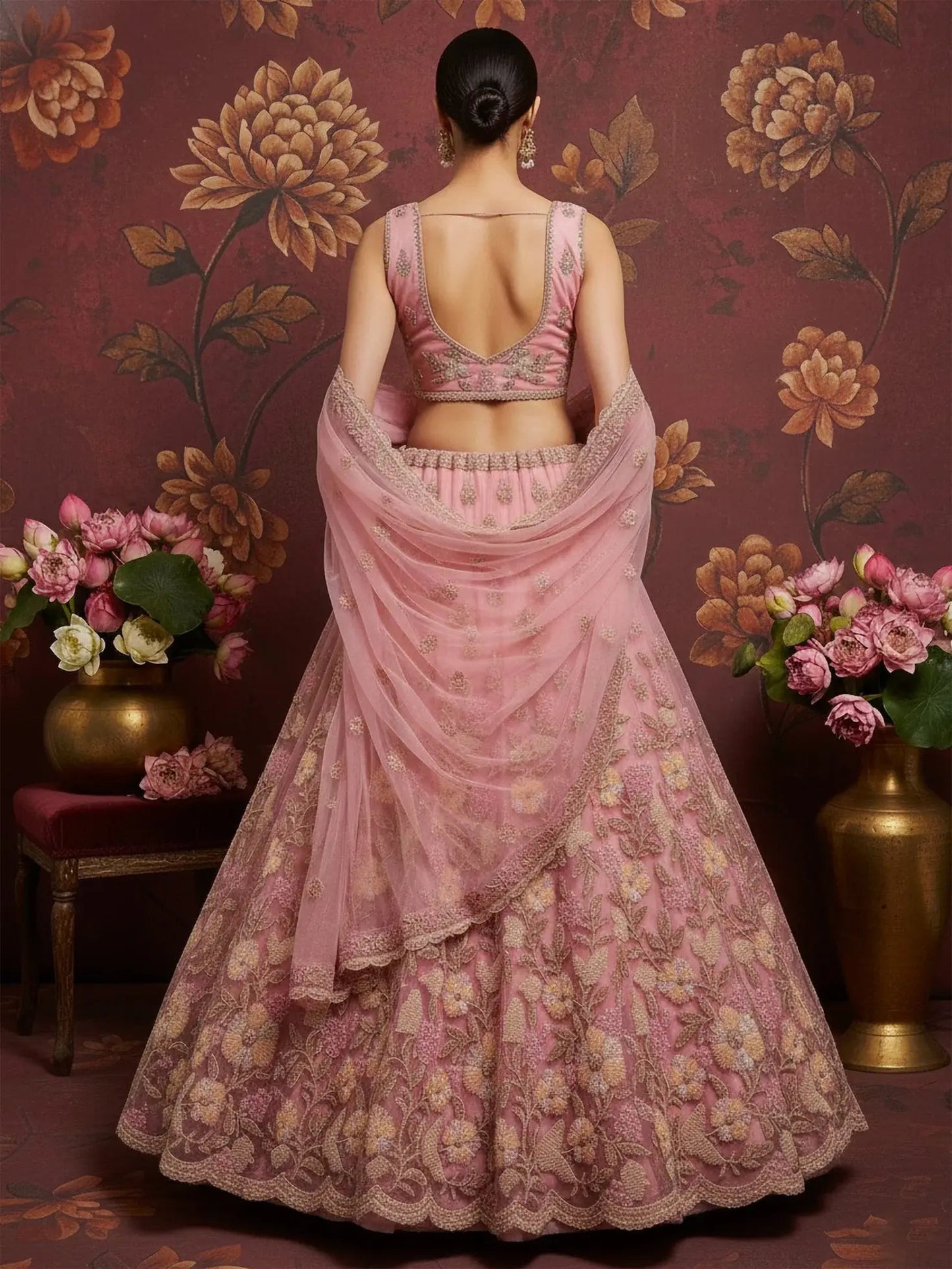 Stupendous Pink Sequins Embroidered Net Engagement Wear Lehenga Choli