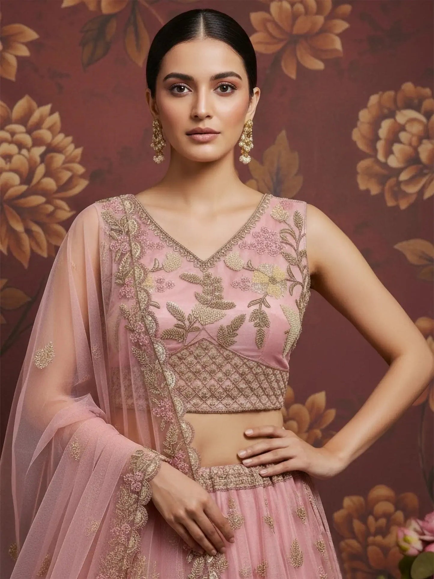 Stupendous Pink Sequins Embroidered Net Engagement Wear Lehenga Choli