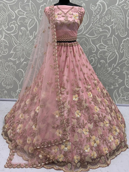 Stupendous Pink Sequins Embroidered Net Engagement Wear Lehenga Choli