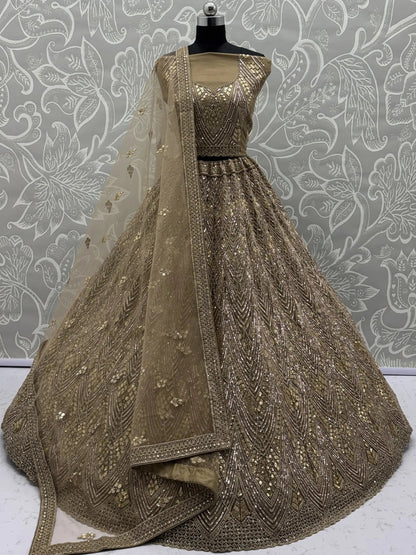 Tremendous Golden Dori Embroidered Net Cocktail Wear Lehenga Choli With Dupatta