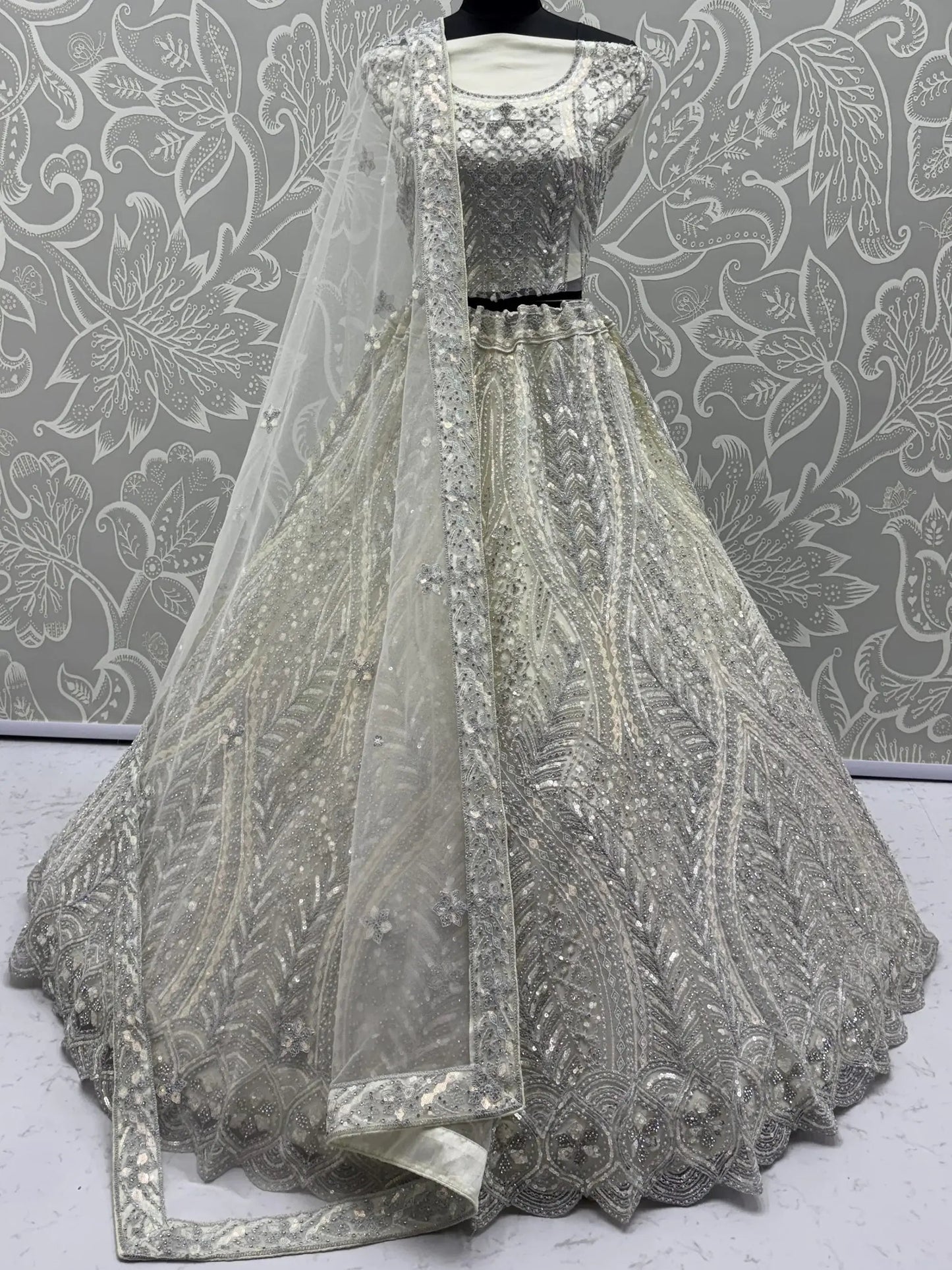 Notable White Embroidered Net Function Wear Lehenga Choli With Dupatta