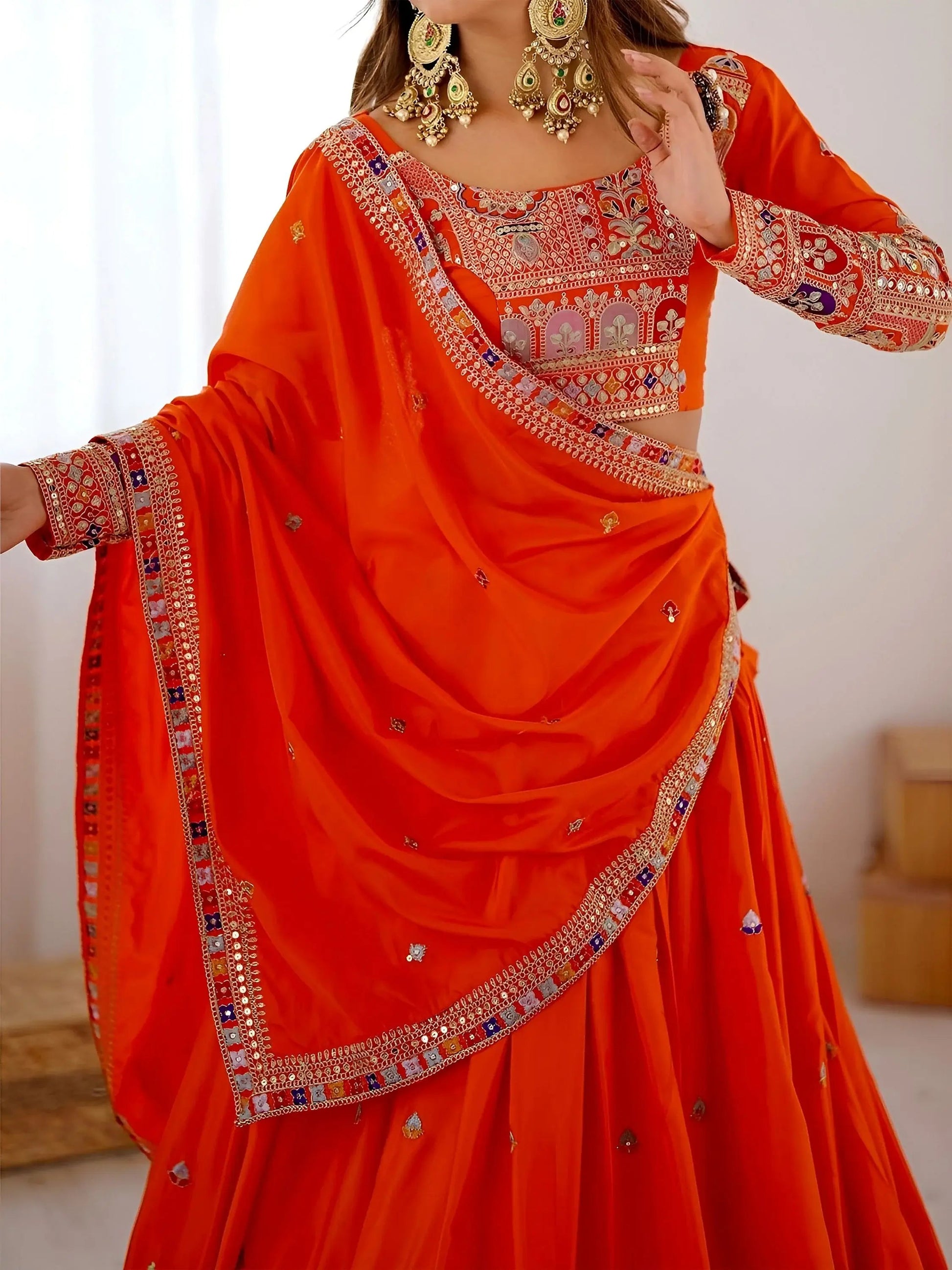 Beautiful Orange Multi Thread Work Crepe Silk Festive Wear Lehenga Choli