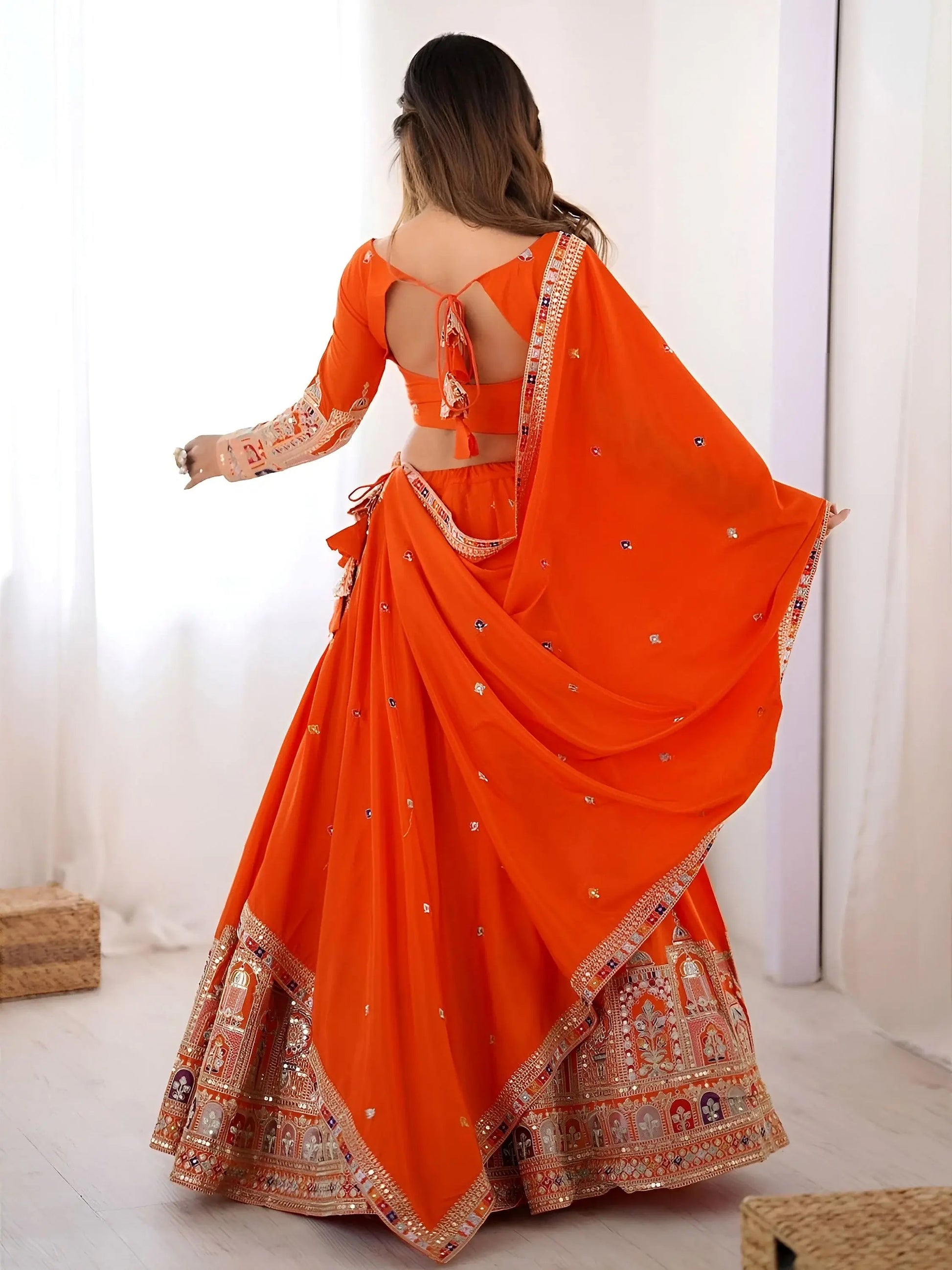 Beautiful Orange Multi Thread Work Crepe Silk Festive Wear Lehenga Choli