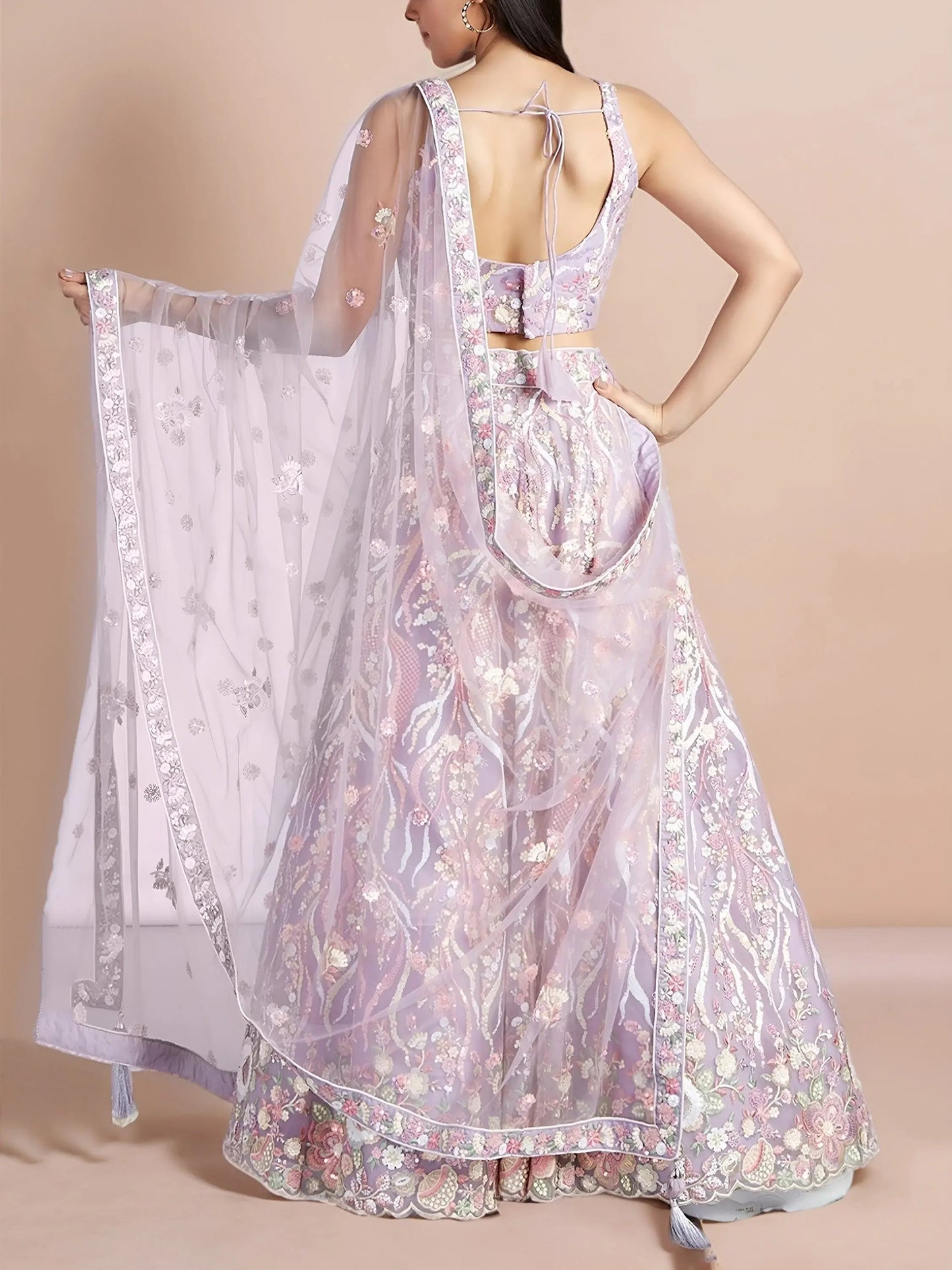Exclusive Lavender Thread Embroidery Net Reception Wear Lehenga Choli