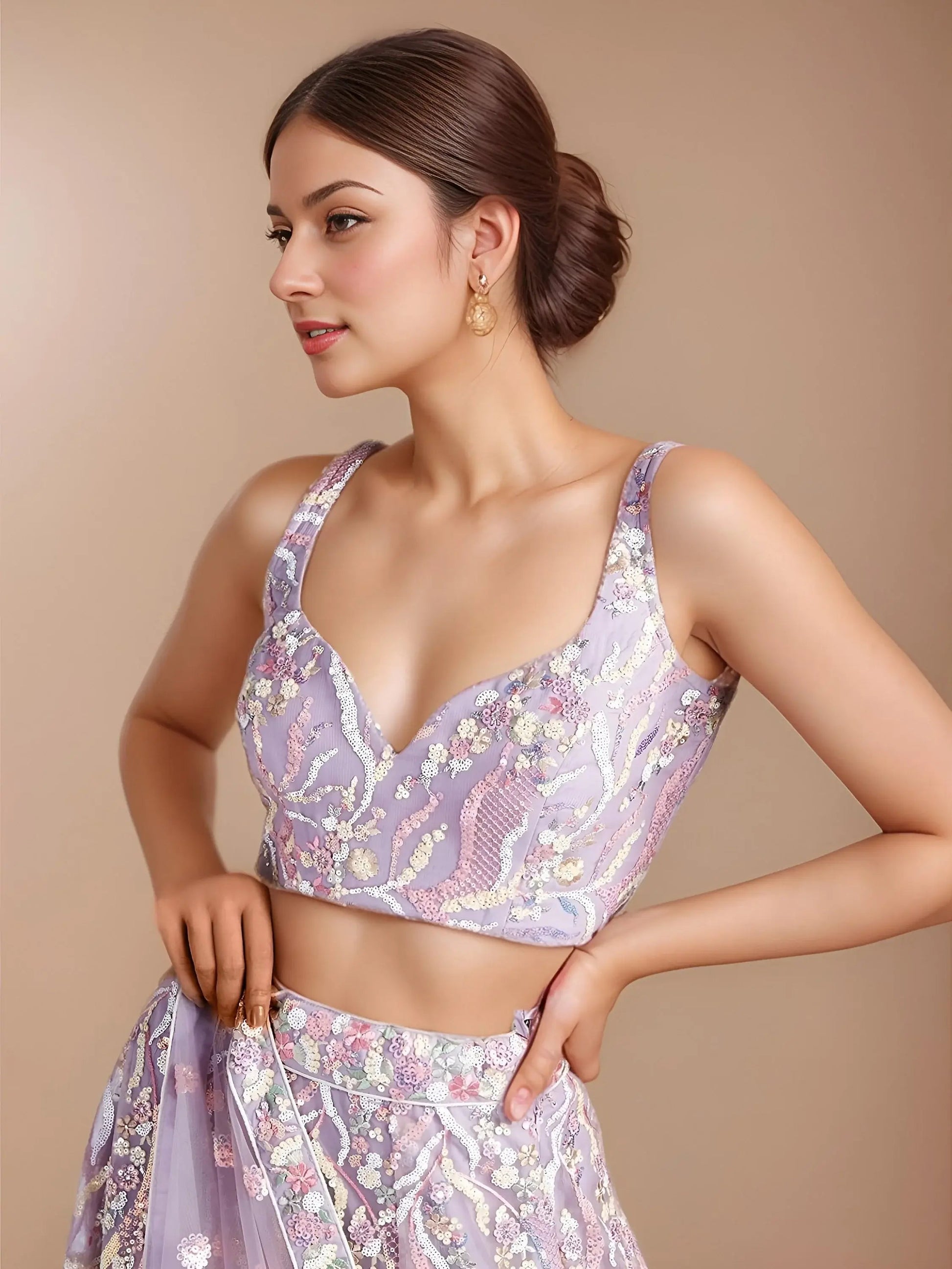 Exclusive Lavender Thread Embroidery Net Reception Wear Lehenga Choli