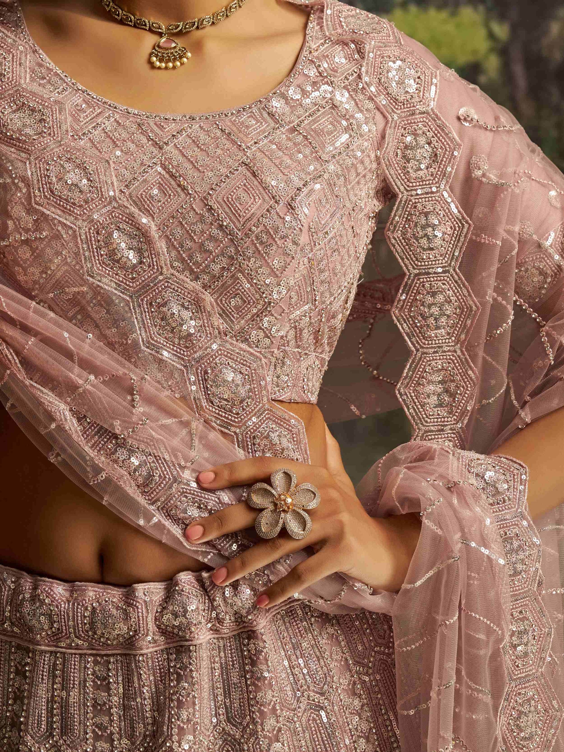 Dazzling Mauve Heavy Embroidered Net Event Wear Lehenga With Blouse