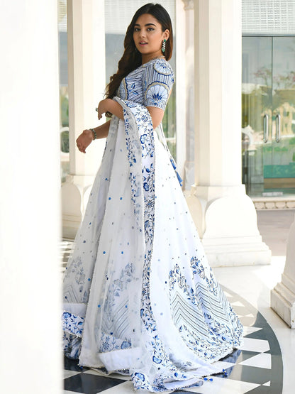 Lovely White Thread Work Sangeet Wear Lehenga Choli With Net Dupatta