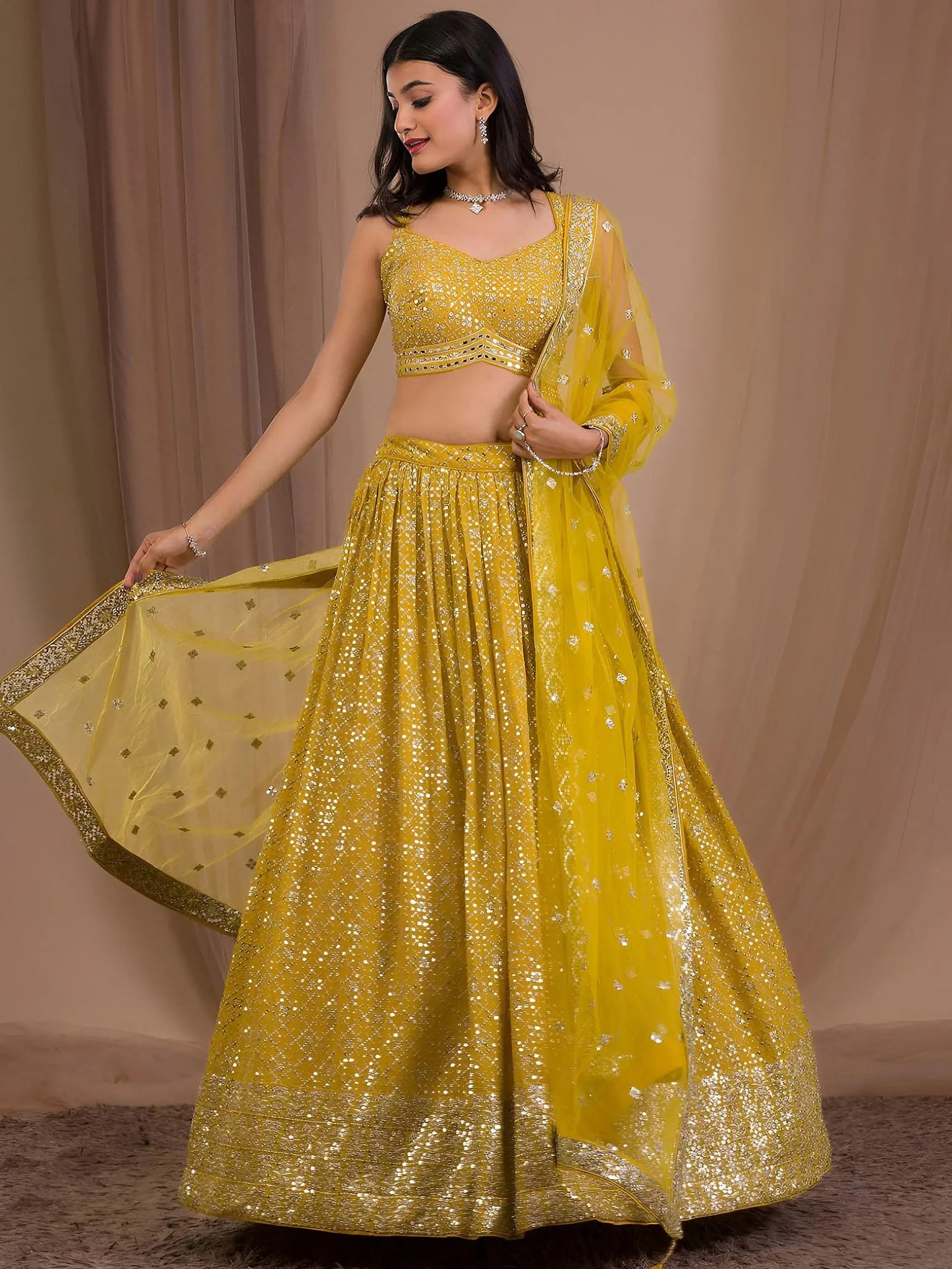Alluring Yellow Sequins Georgette Haldi Wear Lehenga Choli