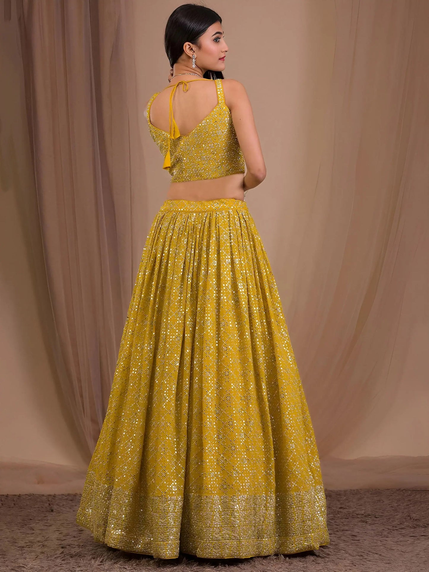 Alluring Yellow Sequins Georgette Haldi Wear Lehenga Choli