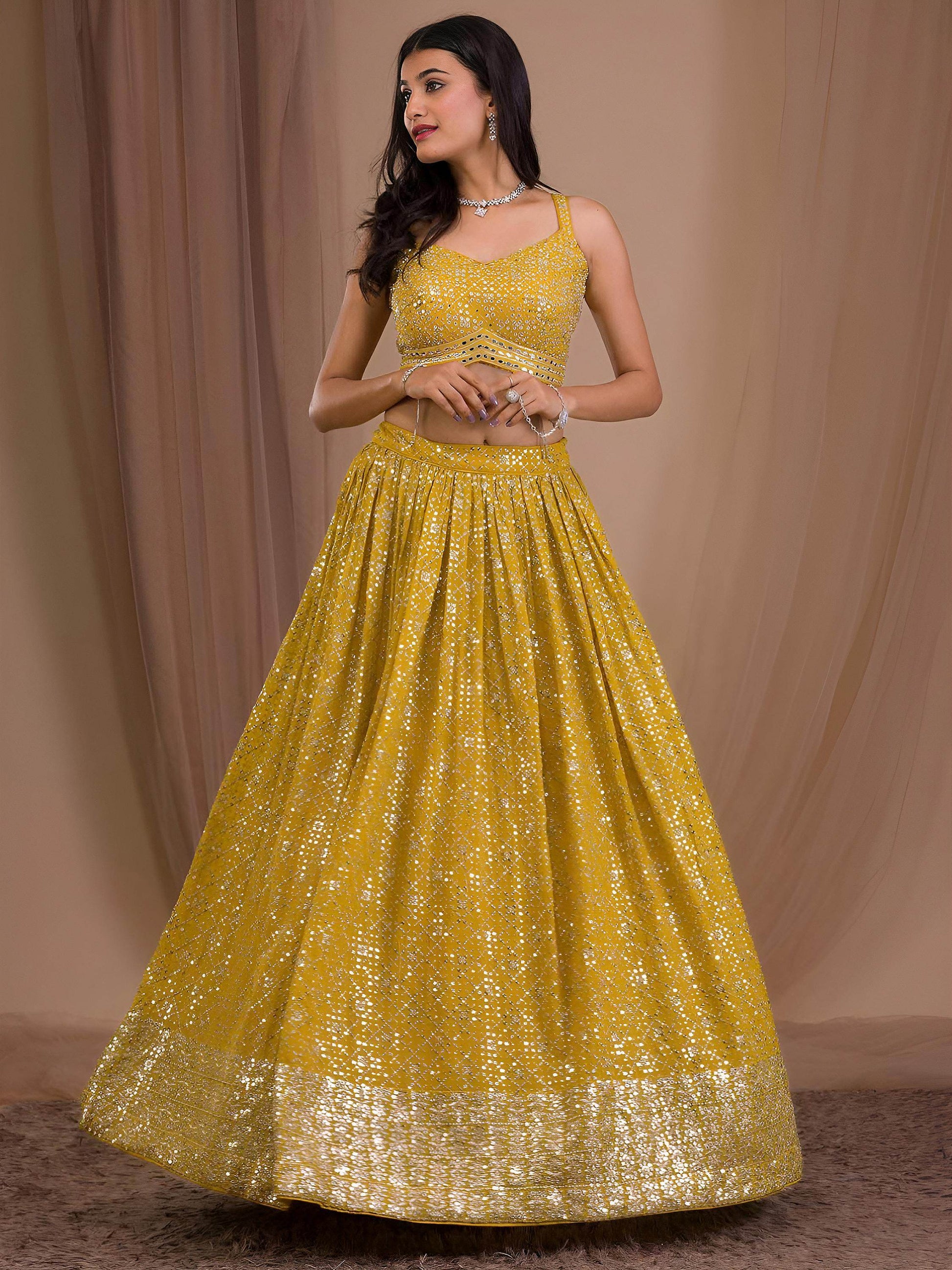 Alluring Yellow Sequins Georgette Haldi Wear Lehenga Choli